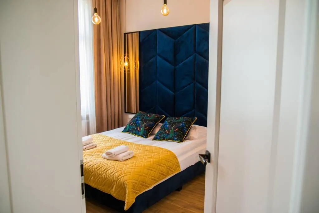 Bedroom, Bed in Miedziany by Rentoom