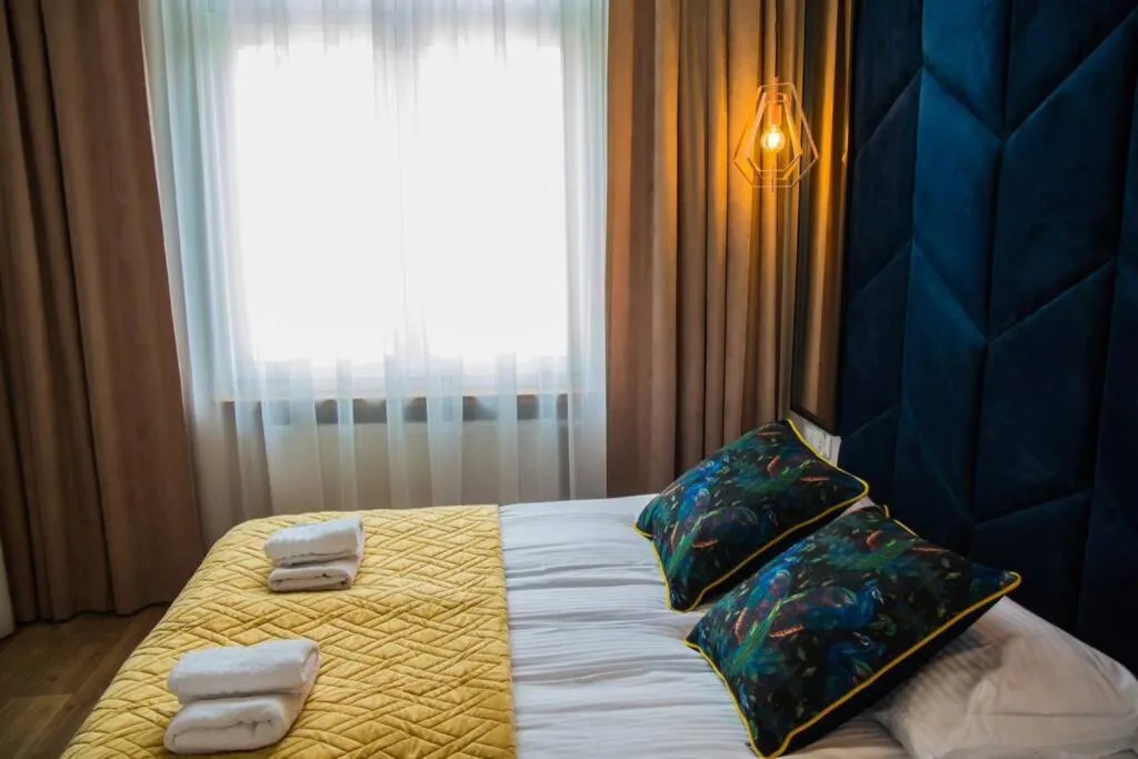 Bed in Miedziany by Rentoom