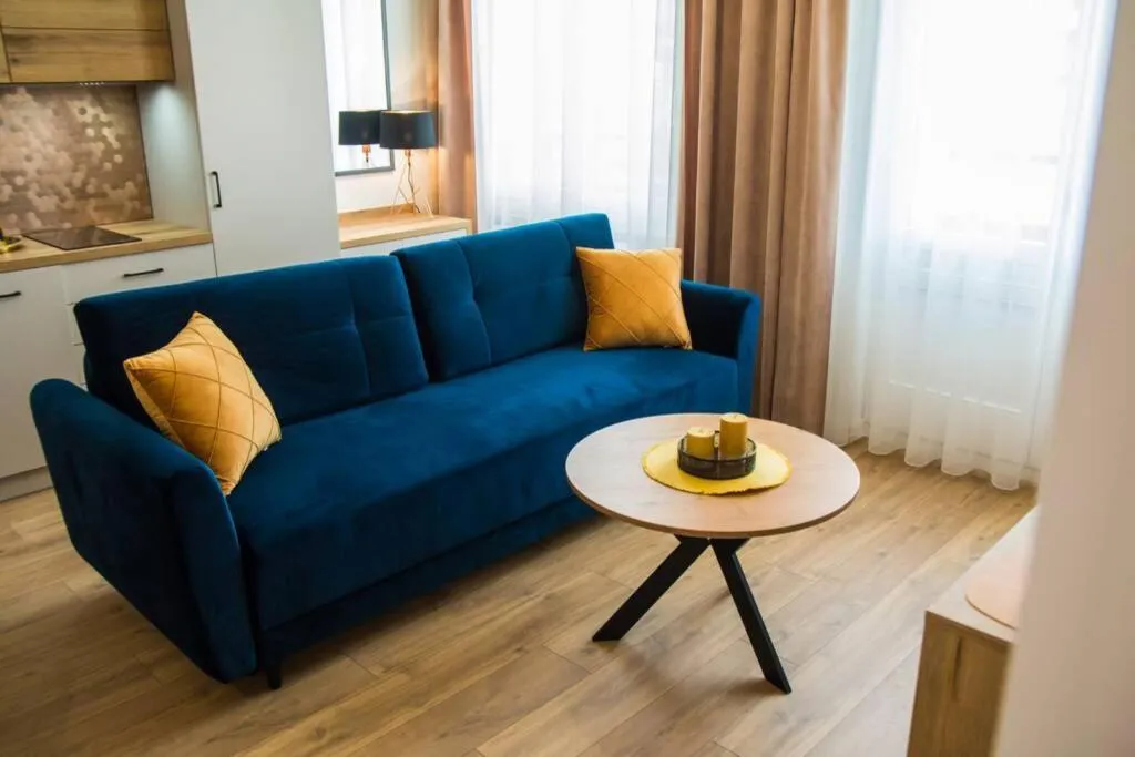 Living room in Miedziany by Rentoom