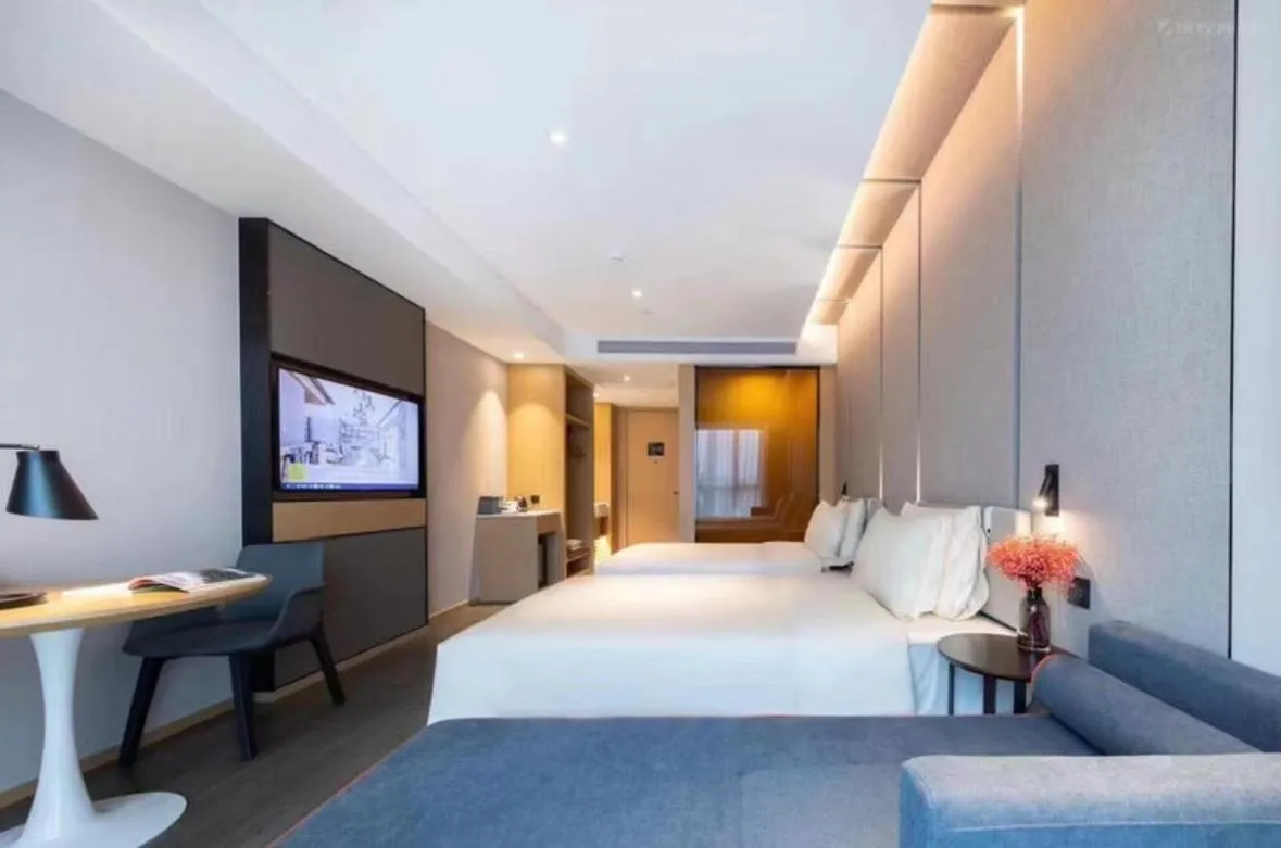 Photo of the whole room, Bed in Atour Hotel Ningbo Fenghua Huizheng Street