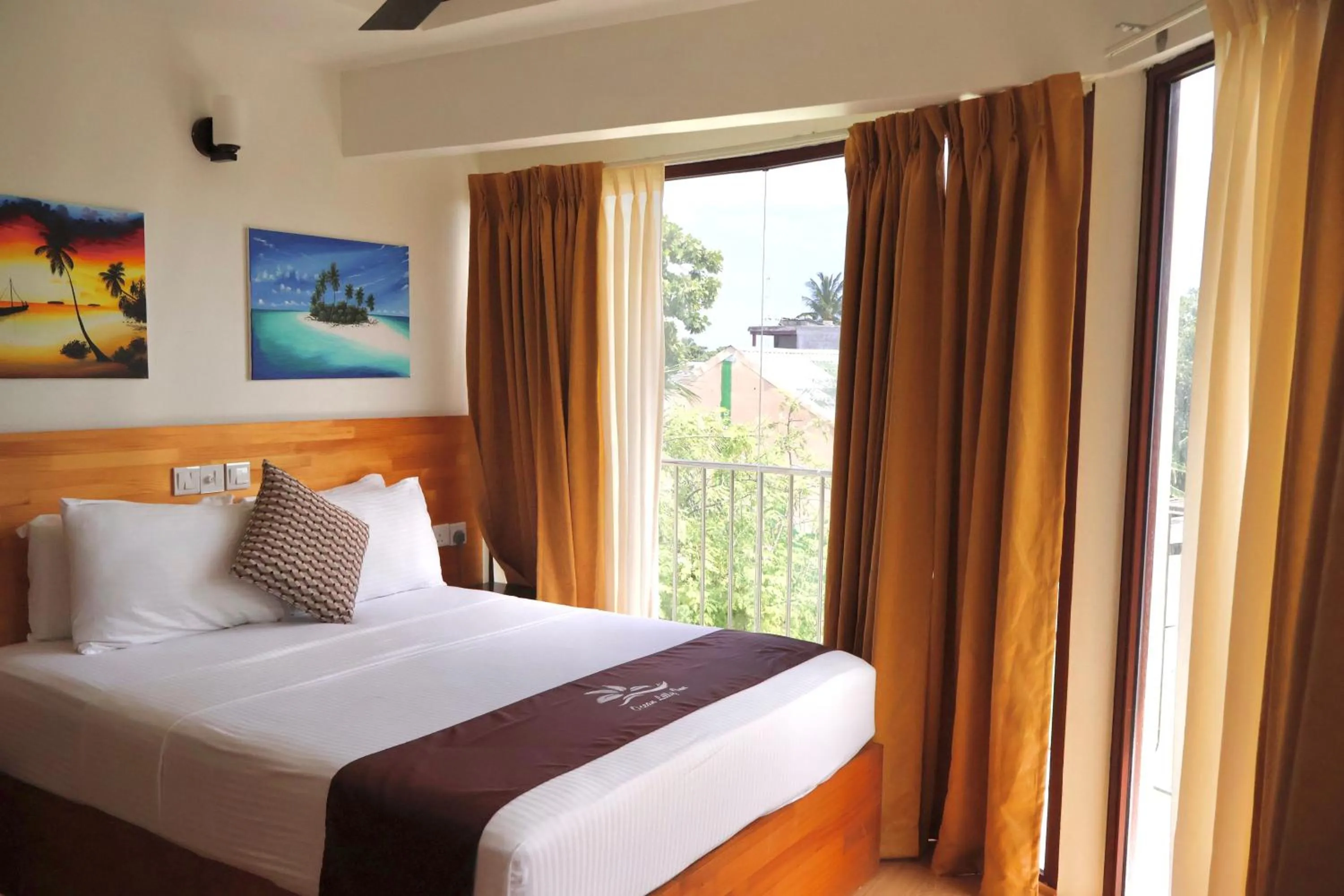 Bed in Ocean Lilly Inn