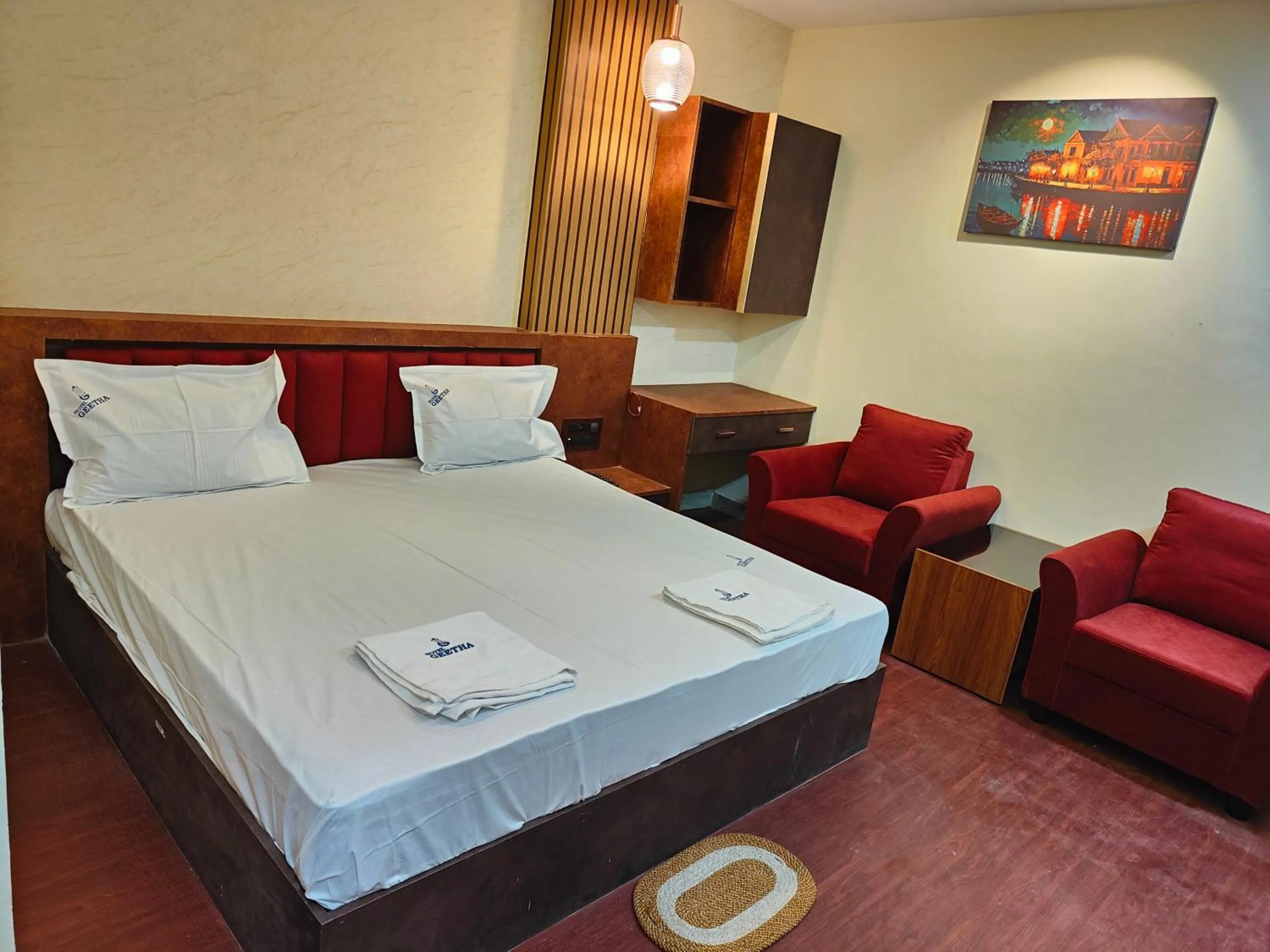 Photo of the whole room, Bed in Hotel Geetha International