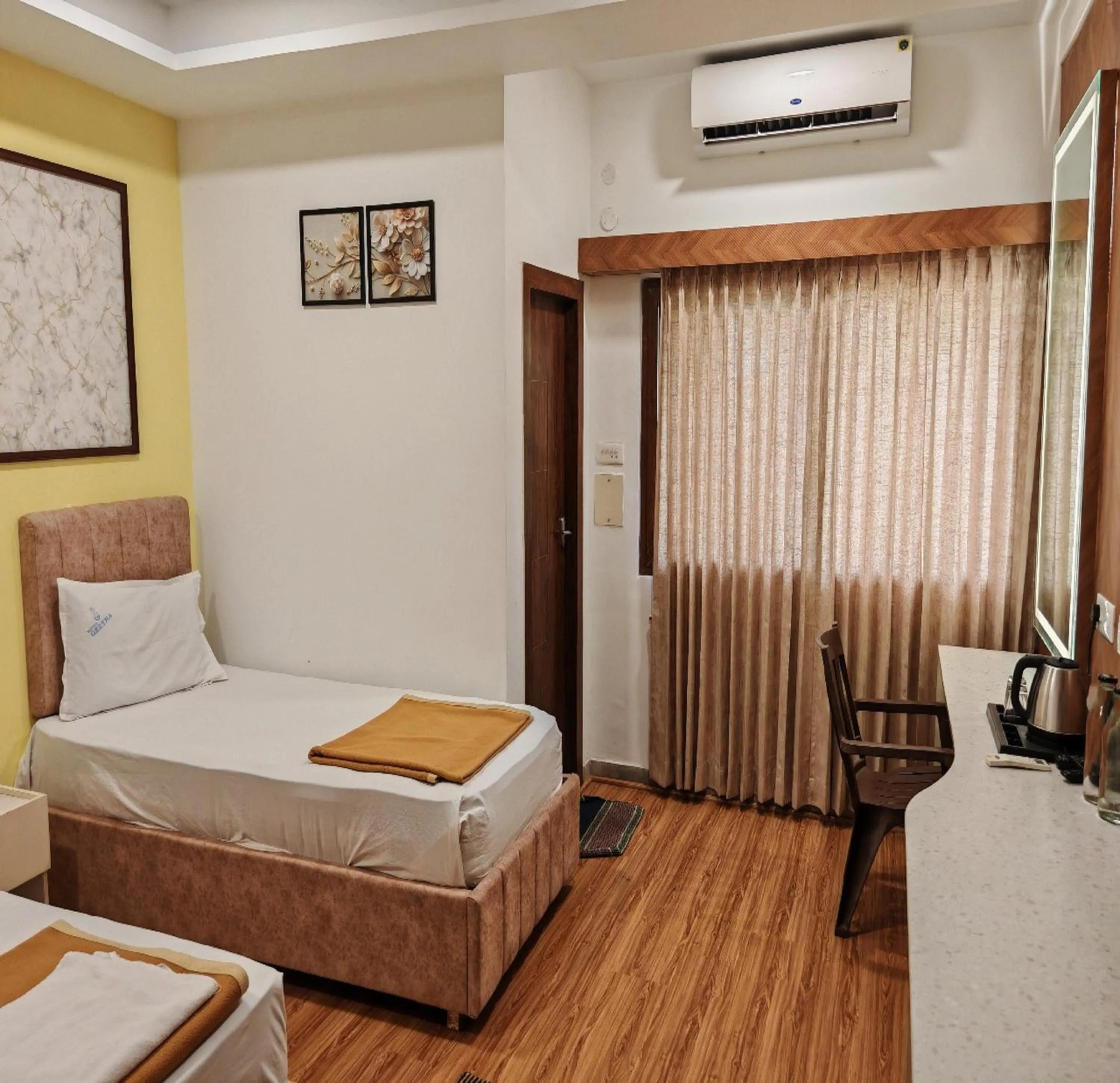 Bed in Hotel Geetha International