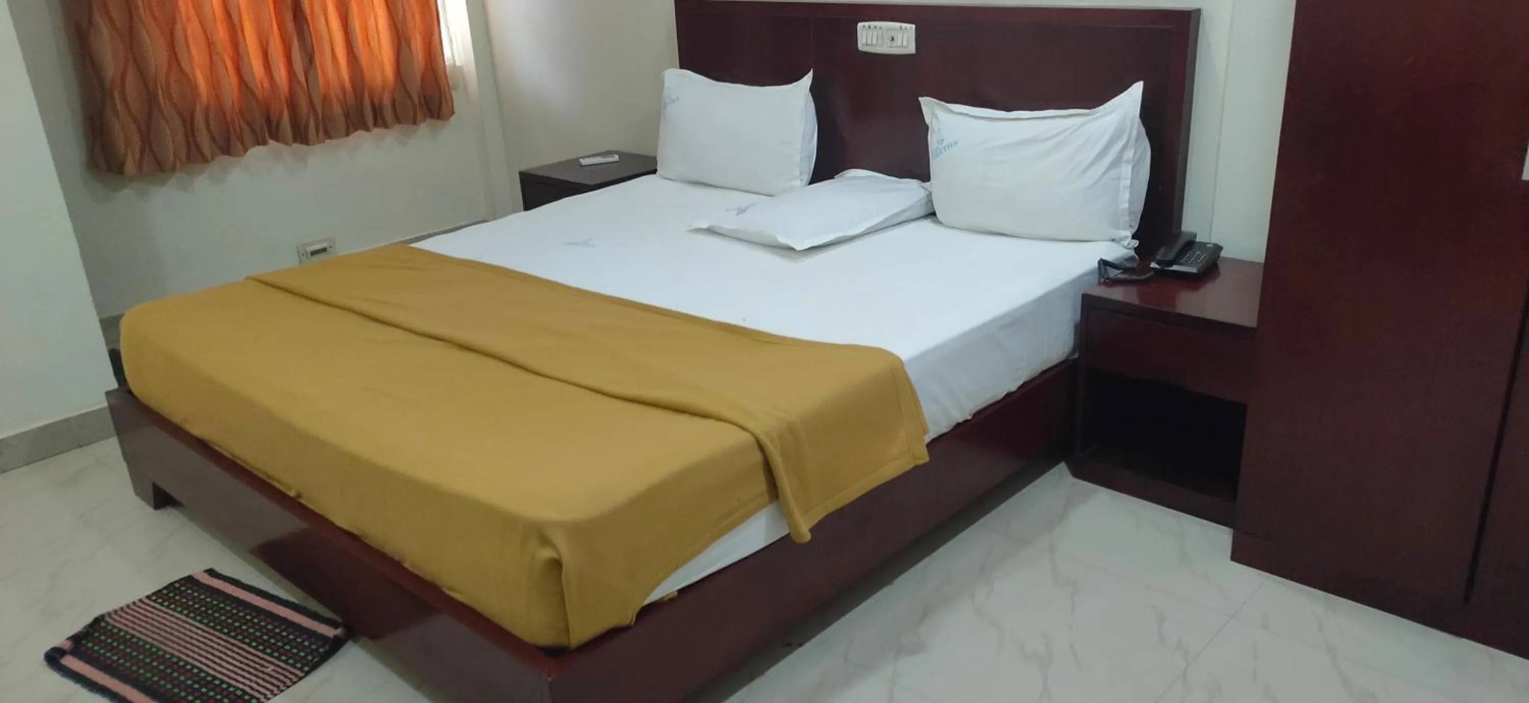 Photo of the whole room, Bed in Hotel Geetha International