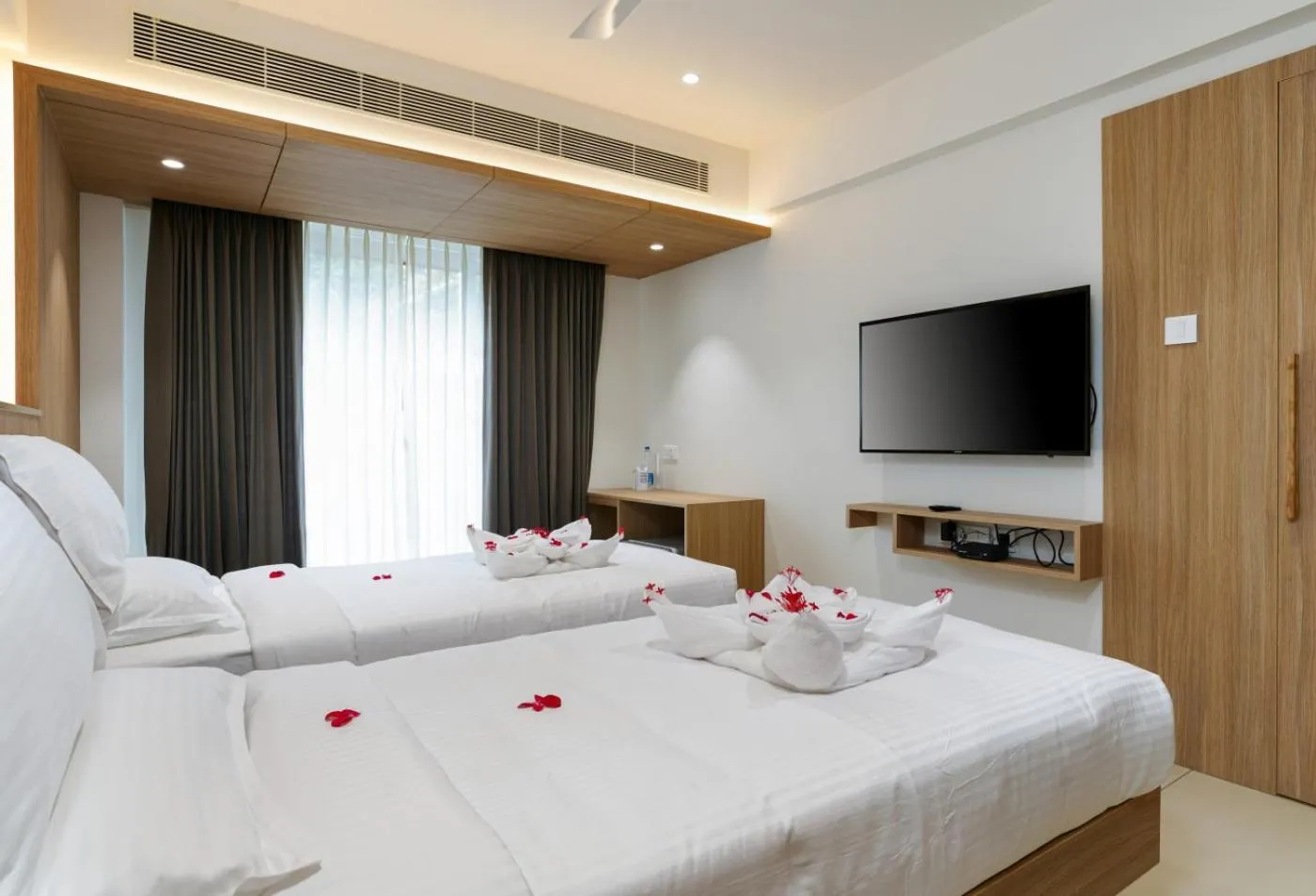 TV and multimedia, Bed in The Trios Hotel