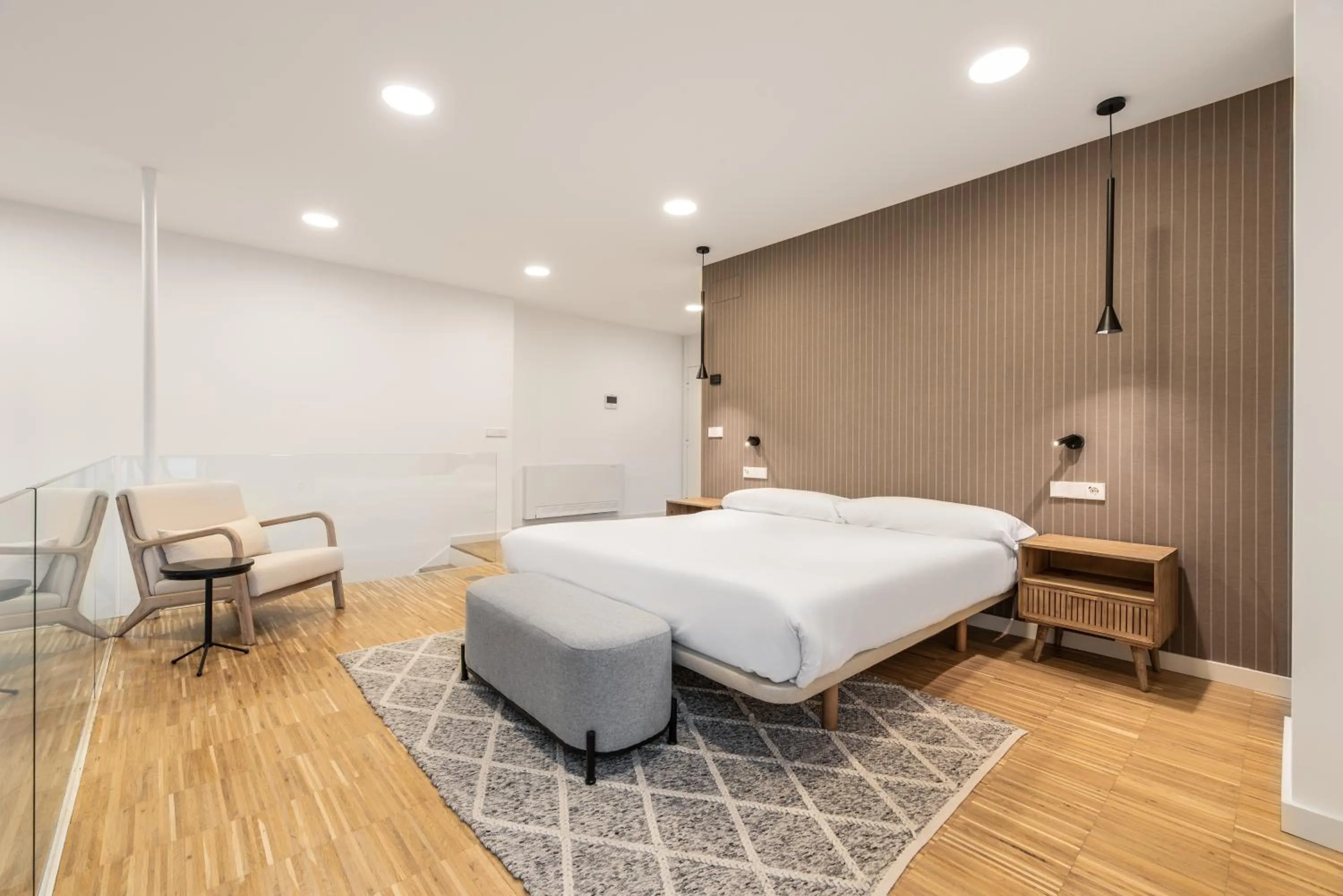 Bed in I Loft Santiago by Upper Luxury Housing