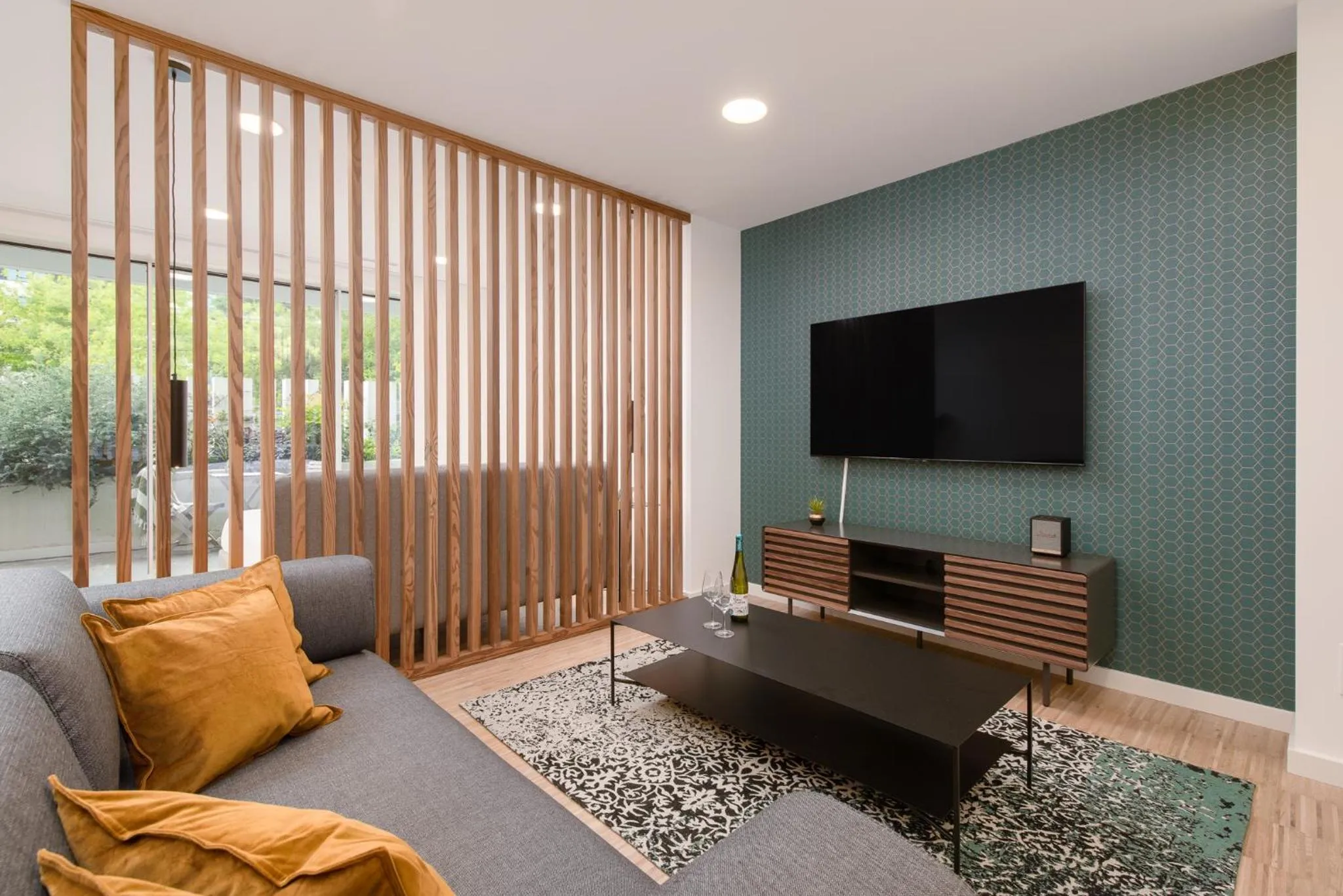 Communal lounge/ TV room in I Loft Santiago by Upper Luxury Housing