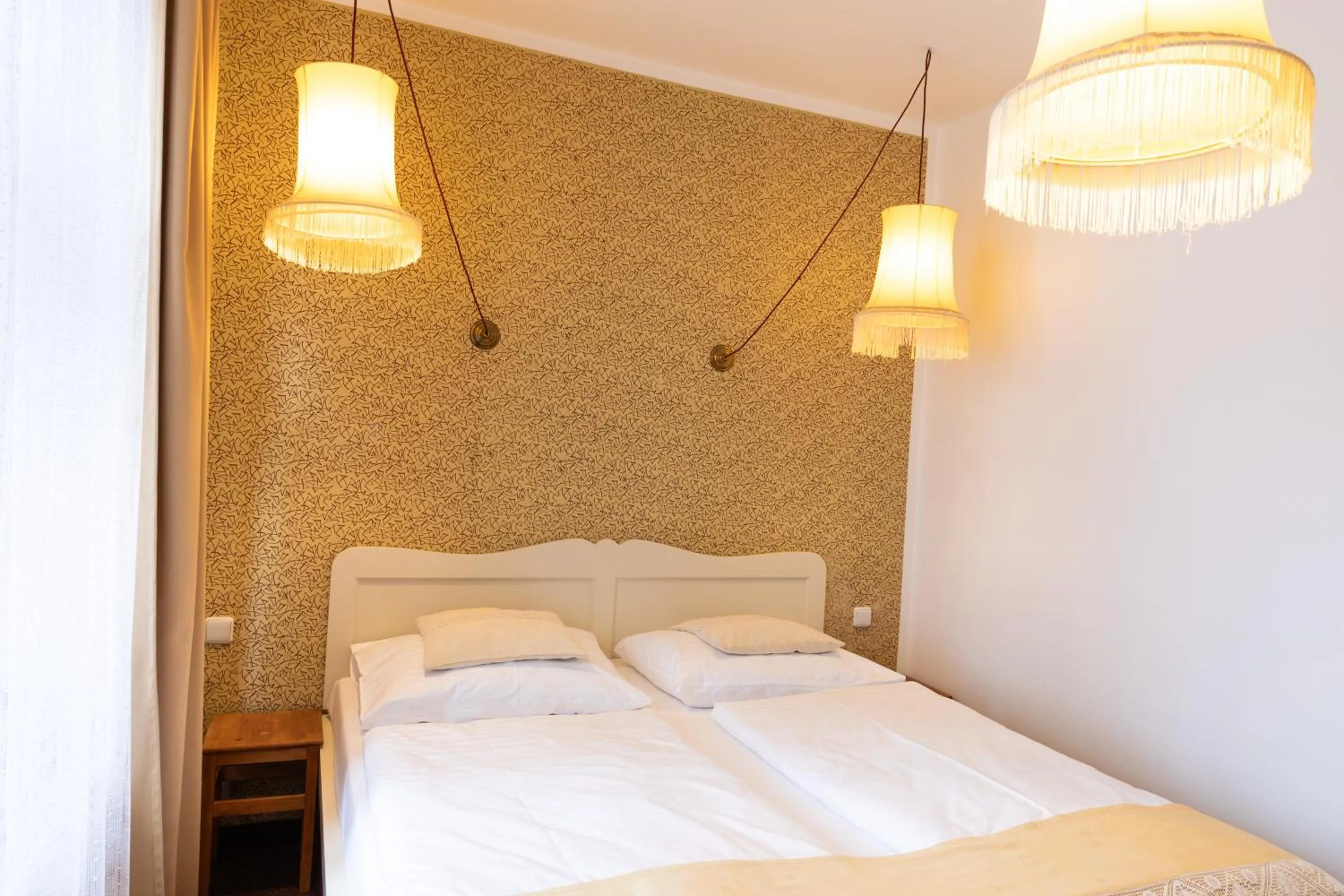 Bed in Hotel Amadeus