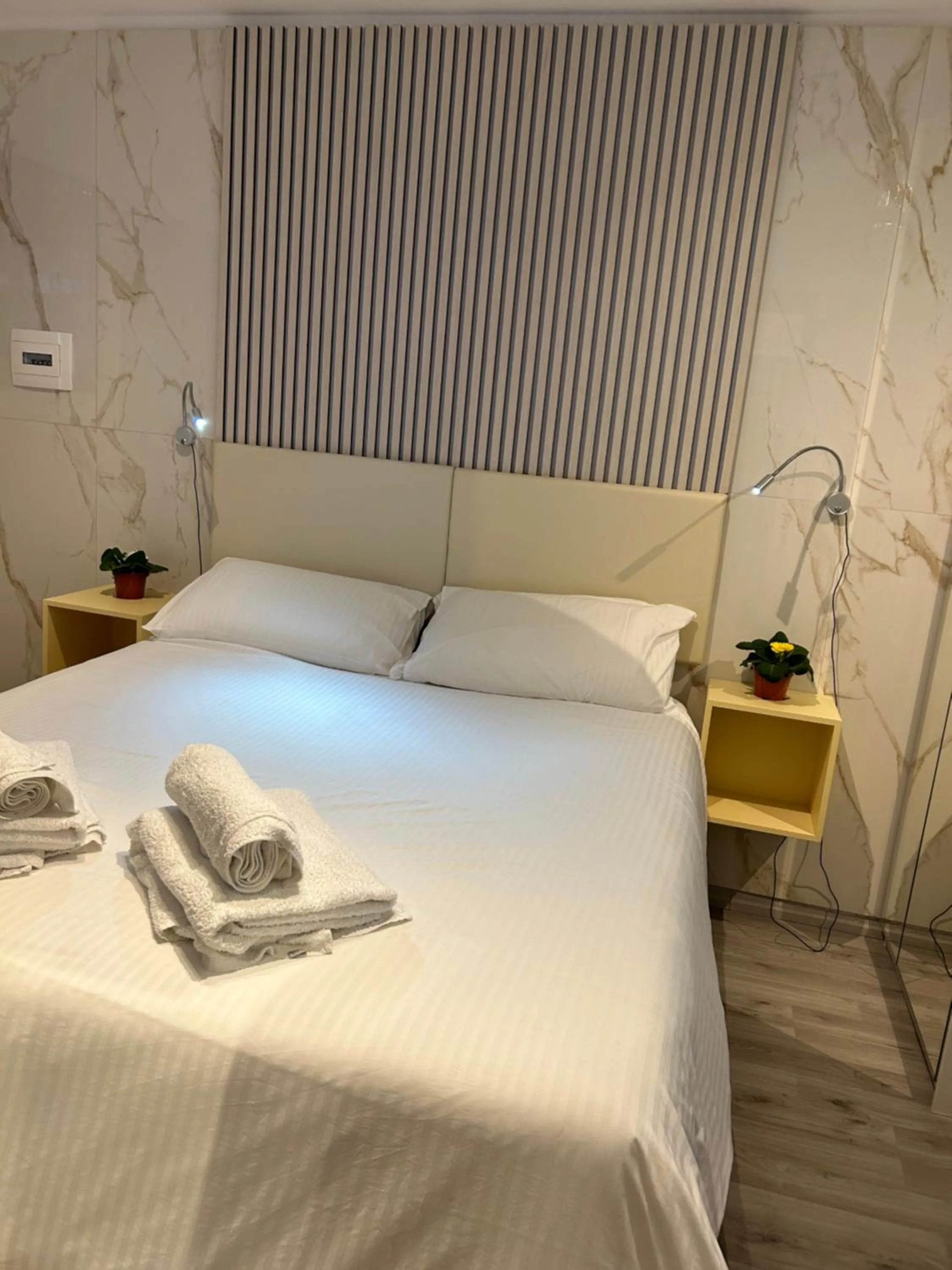 Bed in Confort Suites