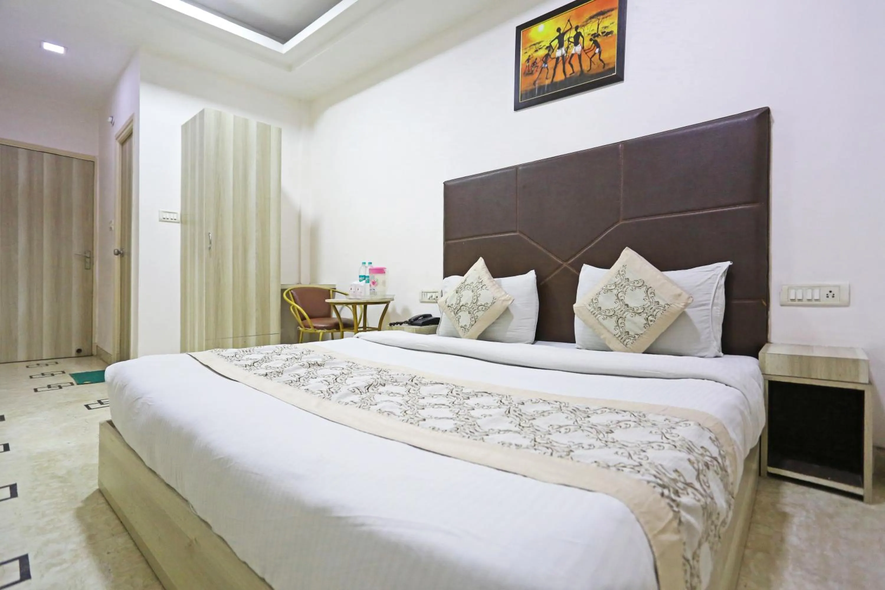 Bed in Hotel Sterling Inn, New Delhi