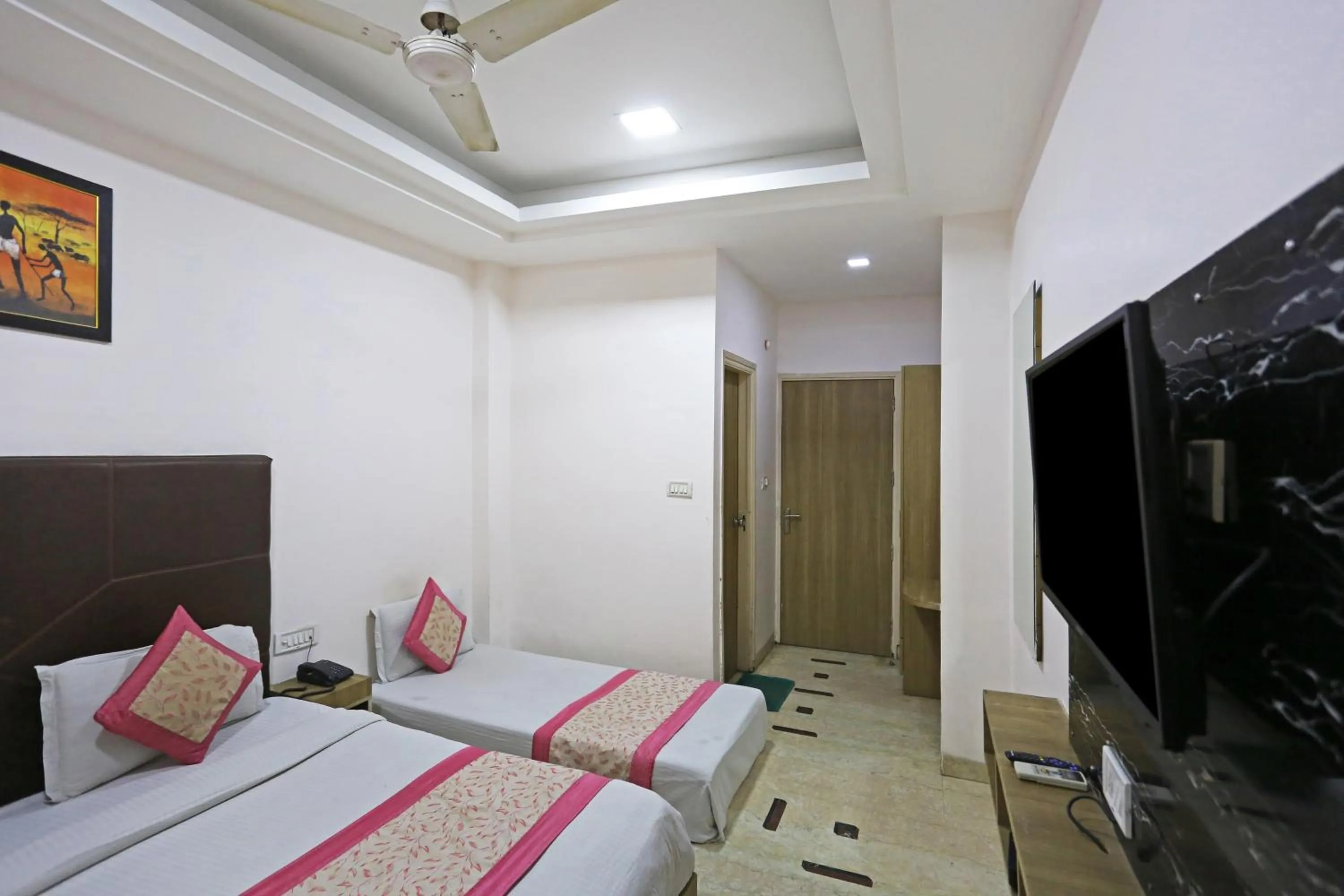 Bed in Hotel Sterling Inn, New Delhi