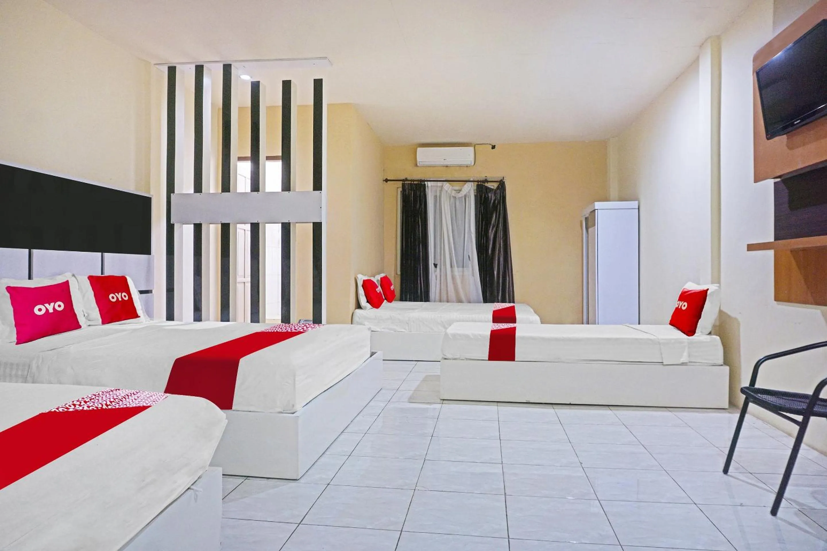 Bedroom in COLLECTION O 91331 Hotel Grand Saota Soppeng