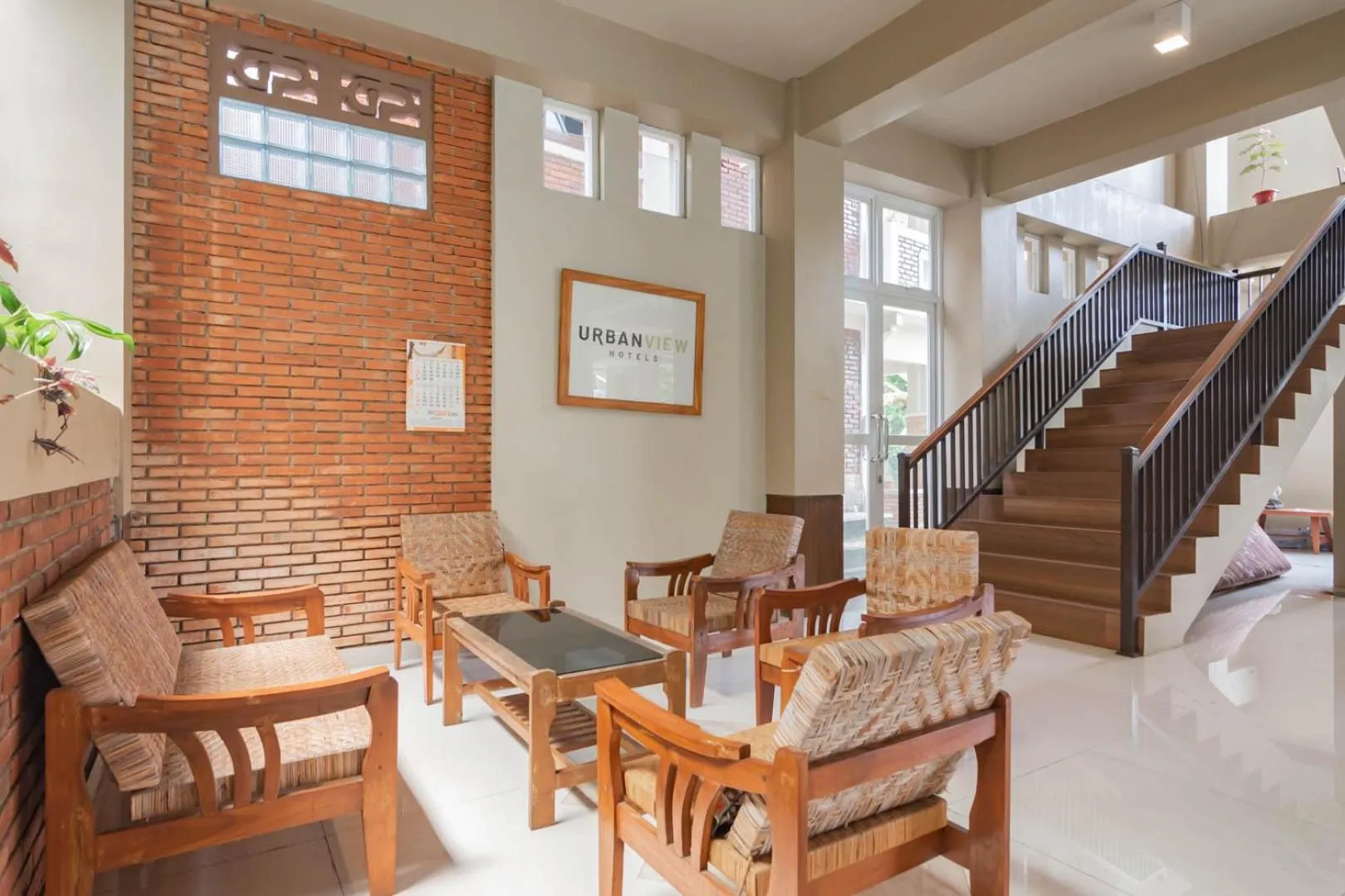 Seating area in Urbanview Hotel Syariah Insani Cisarua Puncak