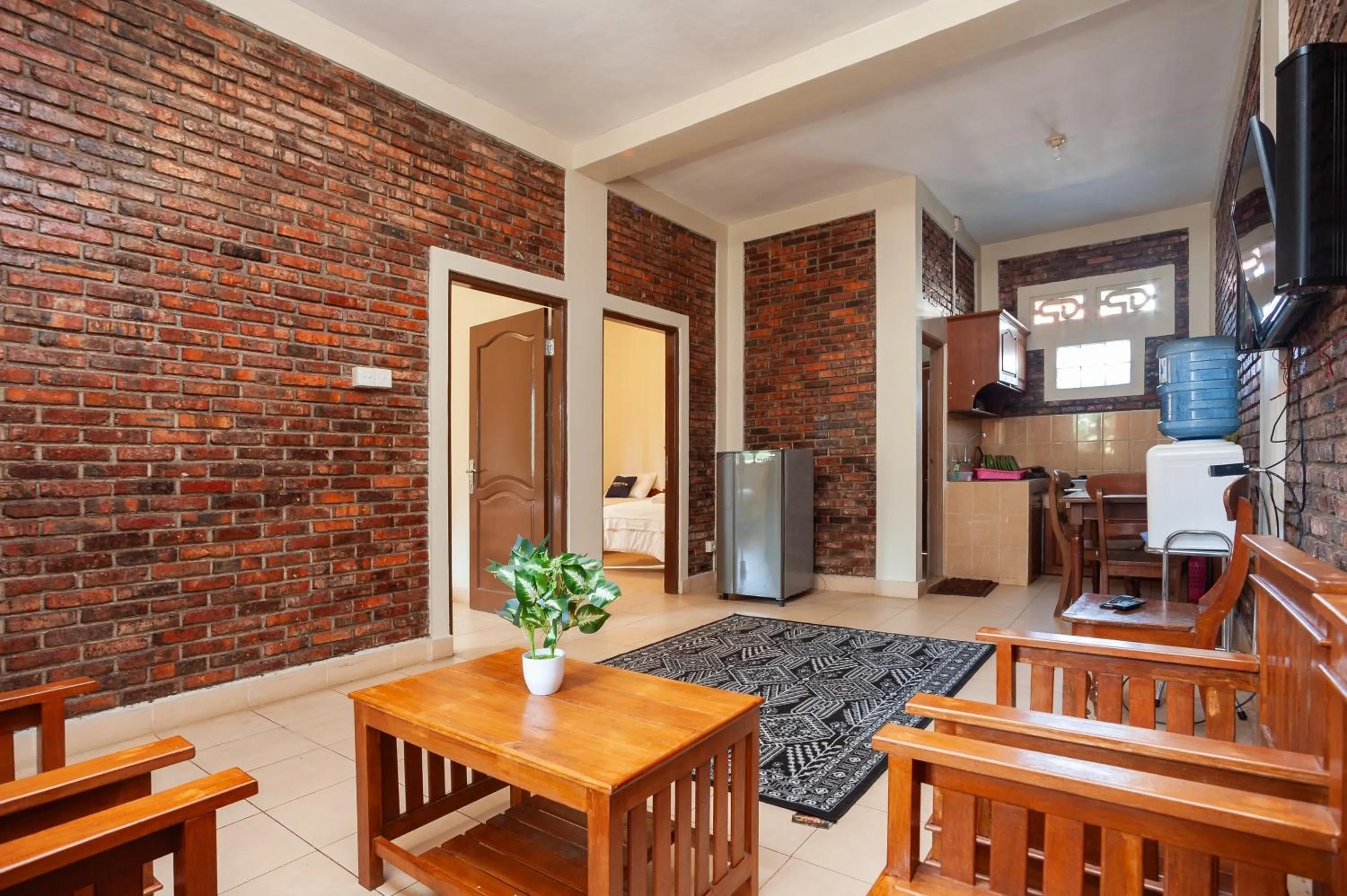 Seating area in Urbanview Hotel Syariah Insani Cisarua Puncak