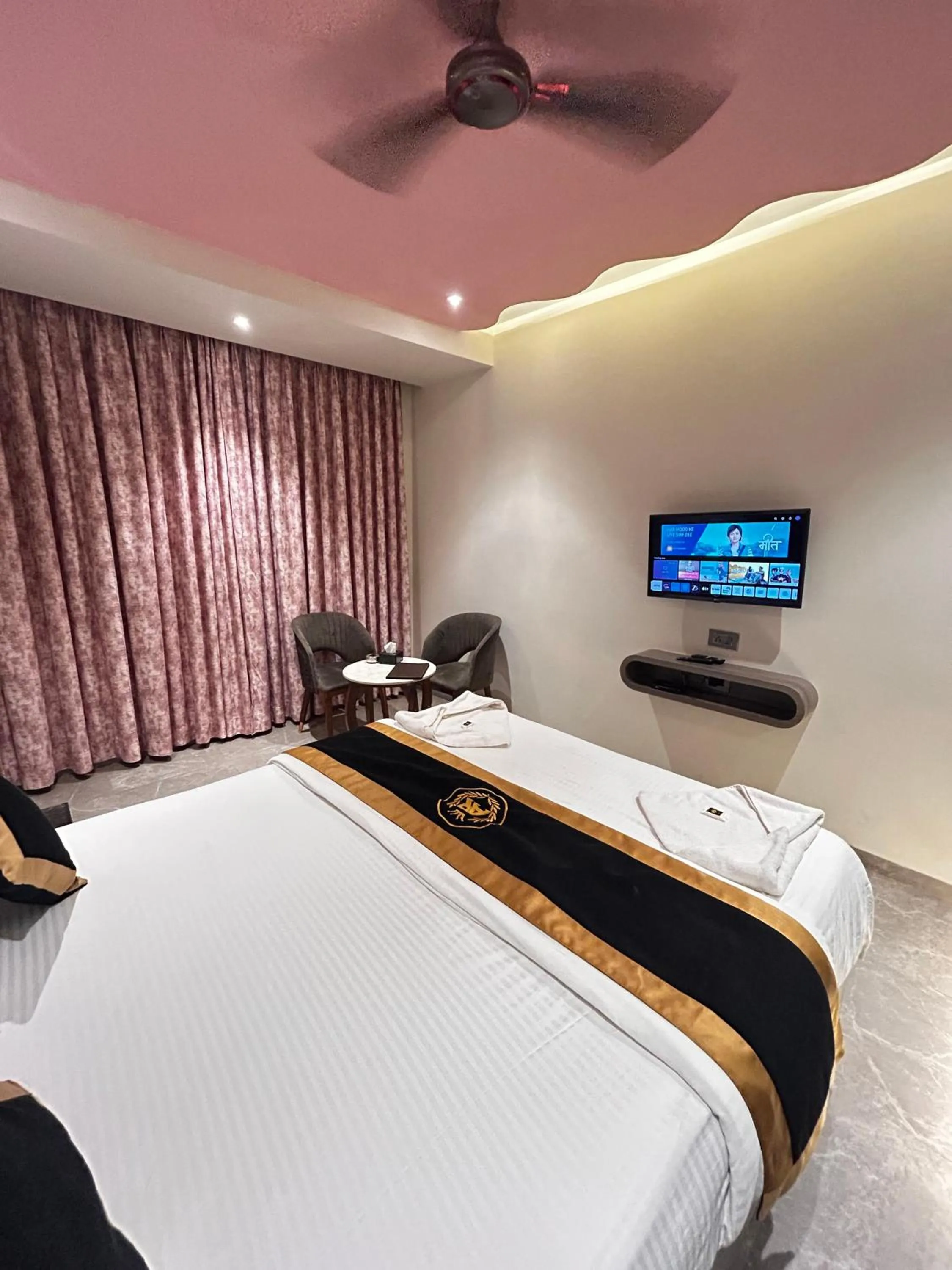 Bed in Hotel AR Residency