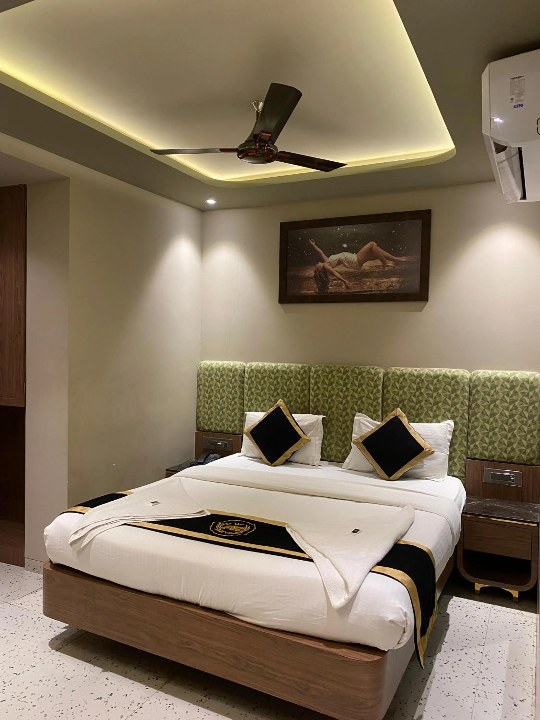 Bed in Hotel AR Residency