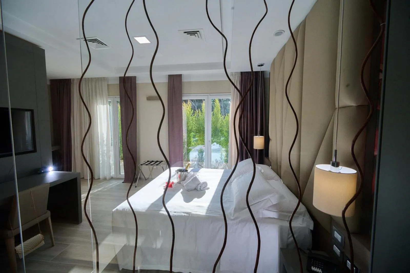 Bed in PARK HOTEL LE DUNE DI GIOVINO