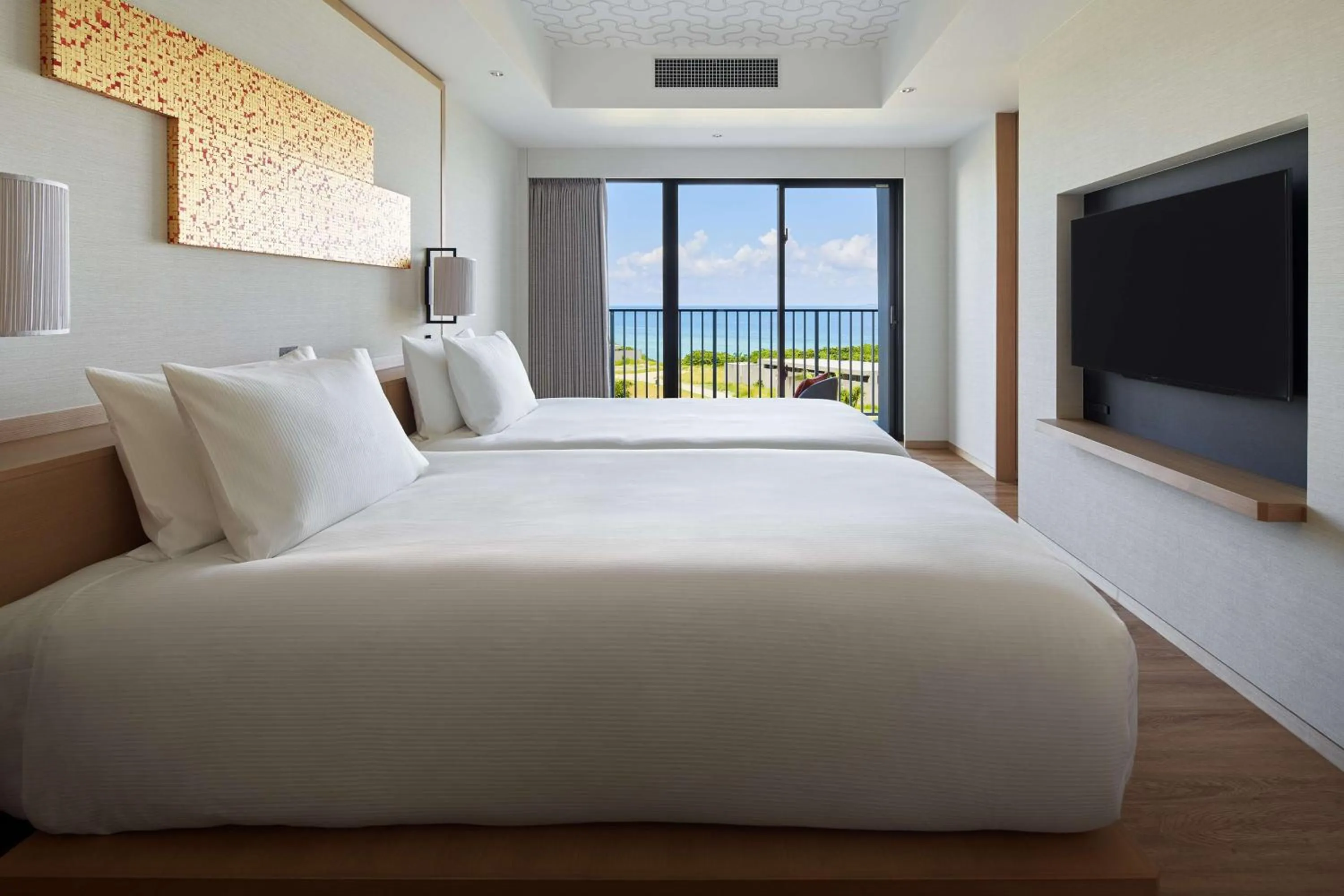 Bedroom, Bed in Hilton Club The Beach Resort Sesoko