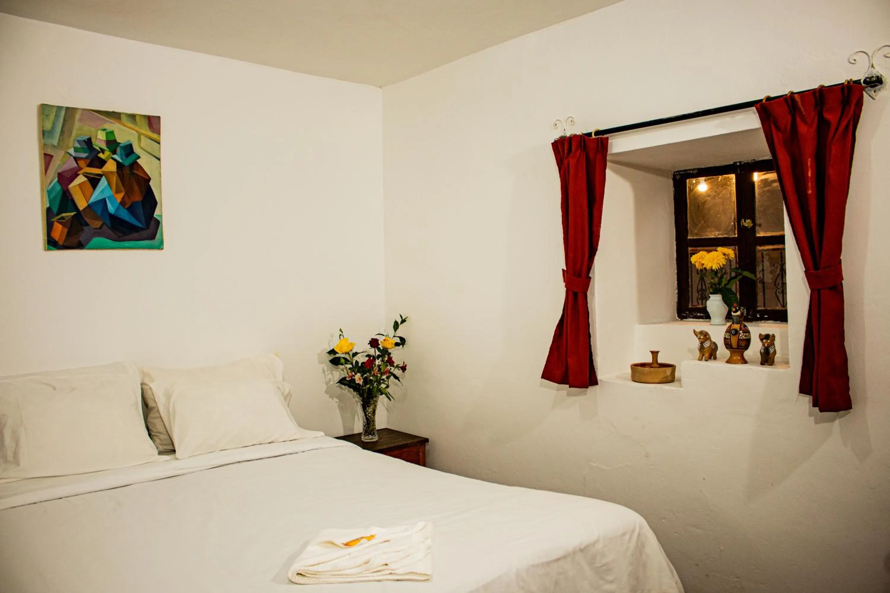 Bed in Posada Catama INN