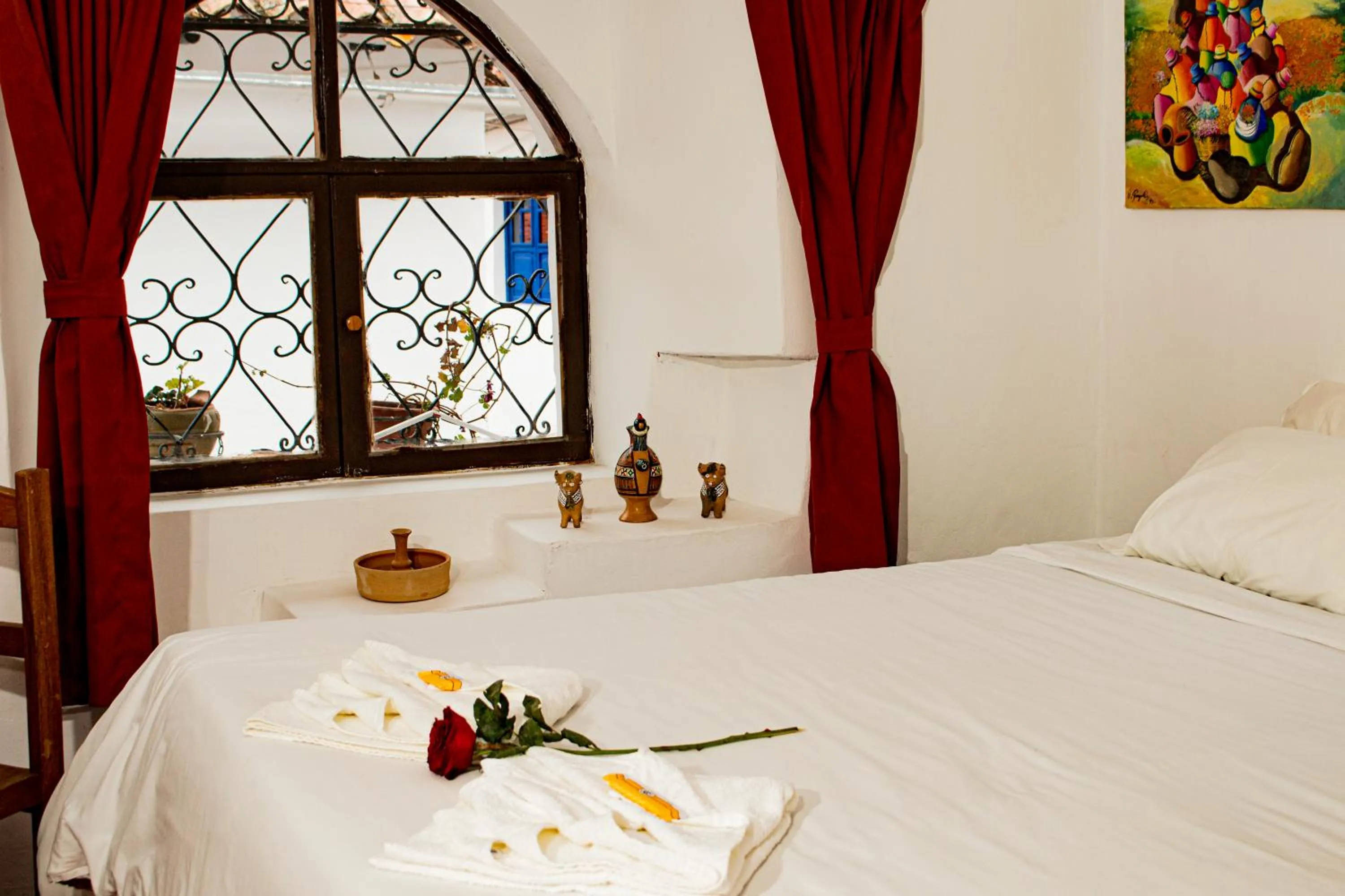 Bed in Posada Catama INN