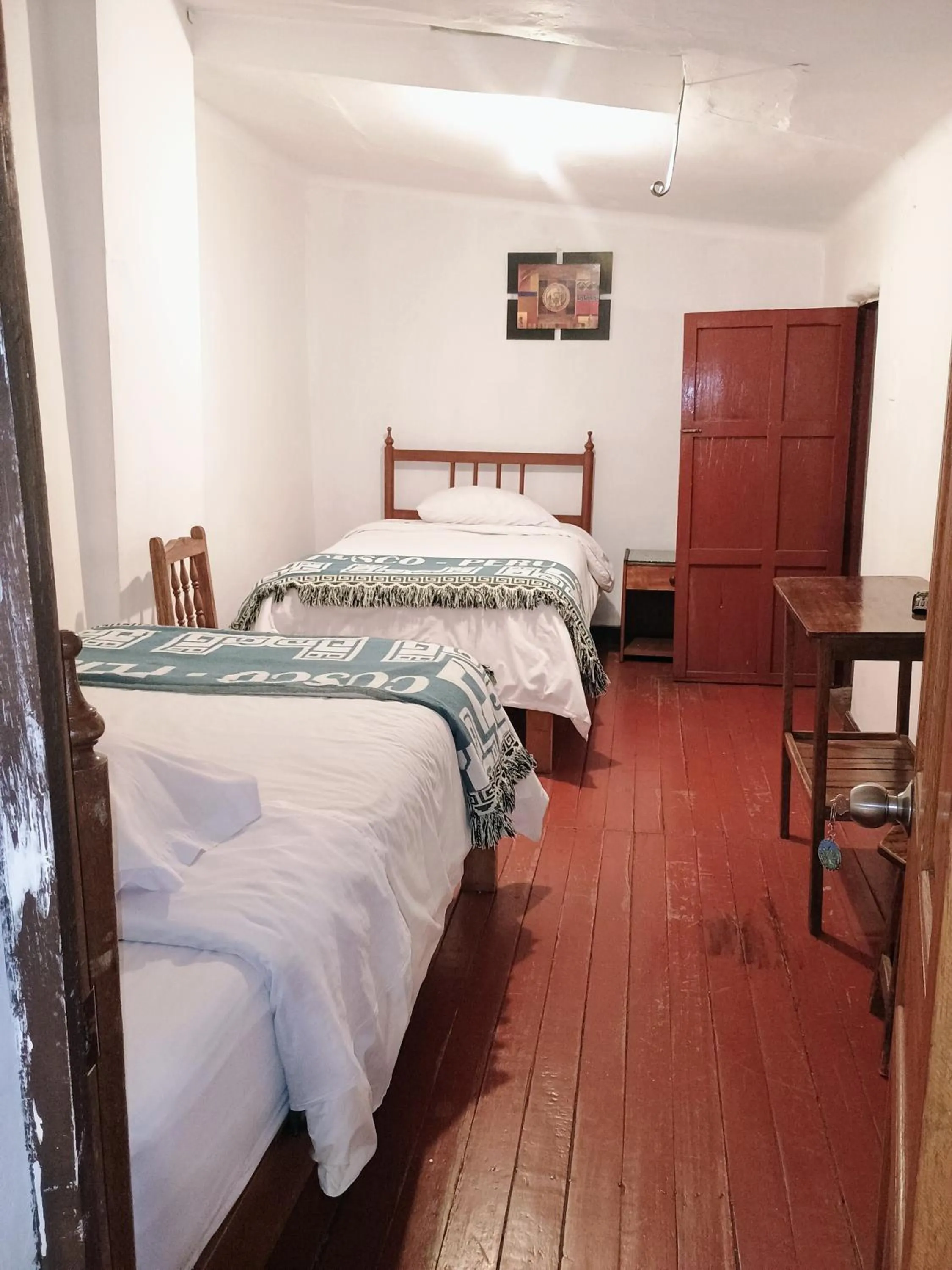 Bed in Posada Catama INN