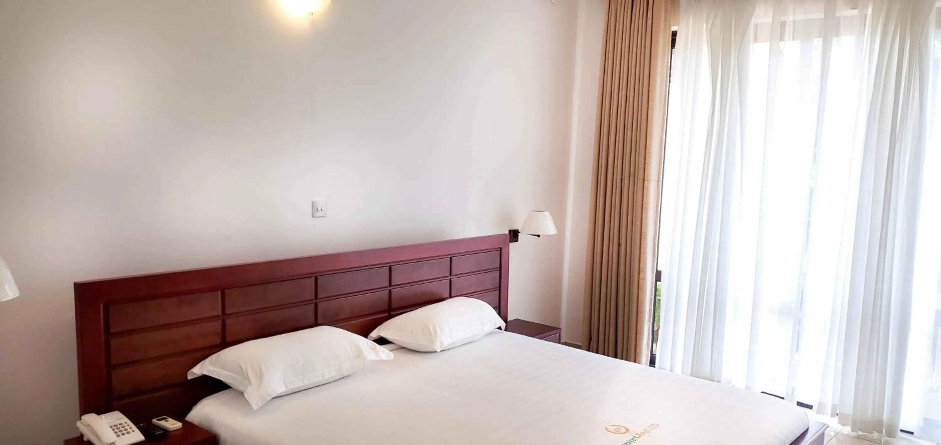 Bed in Greenyard Beach Hotel