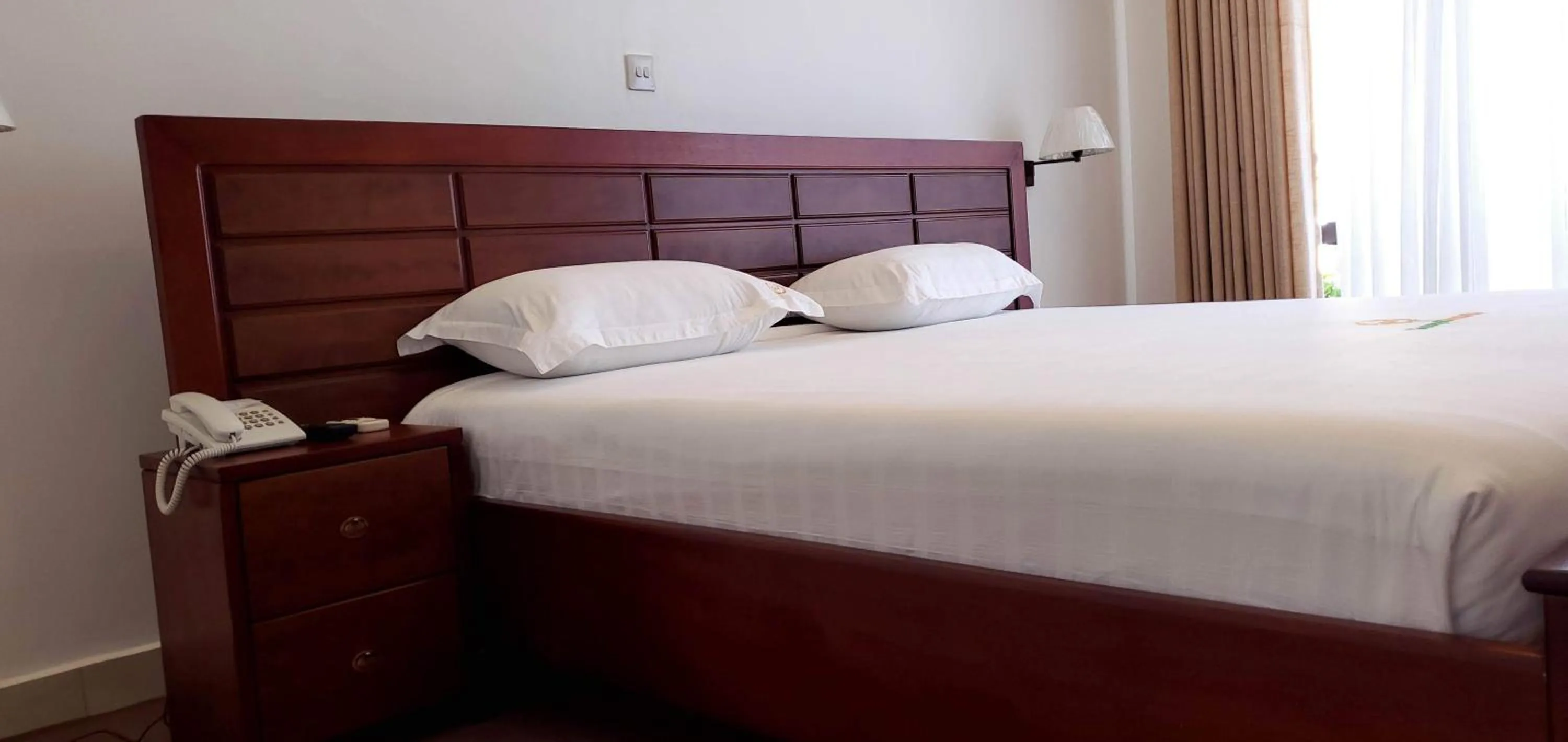 Bed in Greenyard Beach Hotel