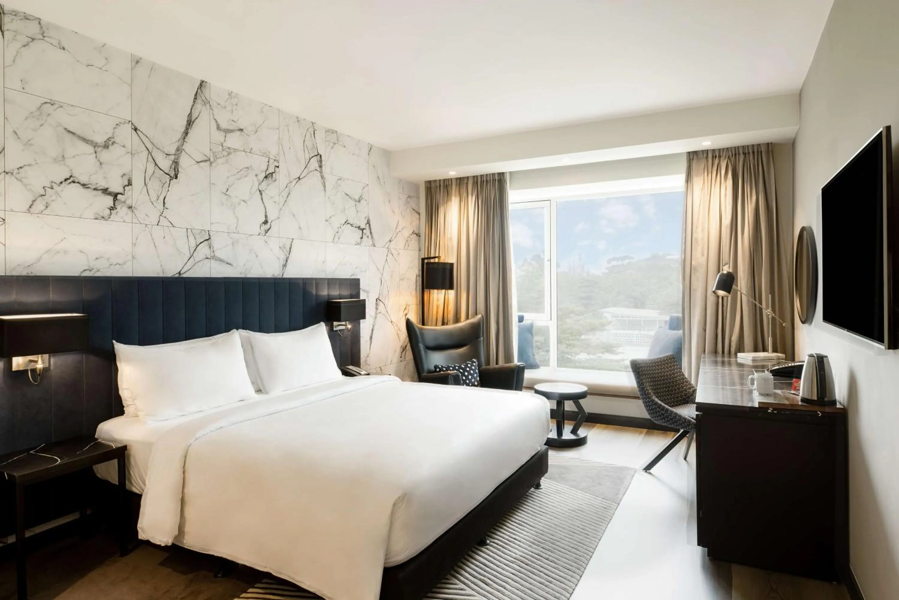 Photo of the whole room, Bed in Radisson Blu Anchorage Hotel