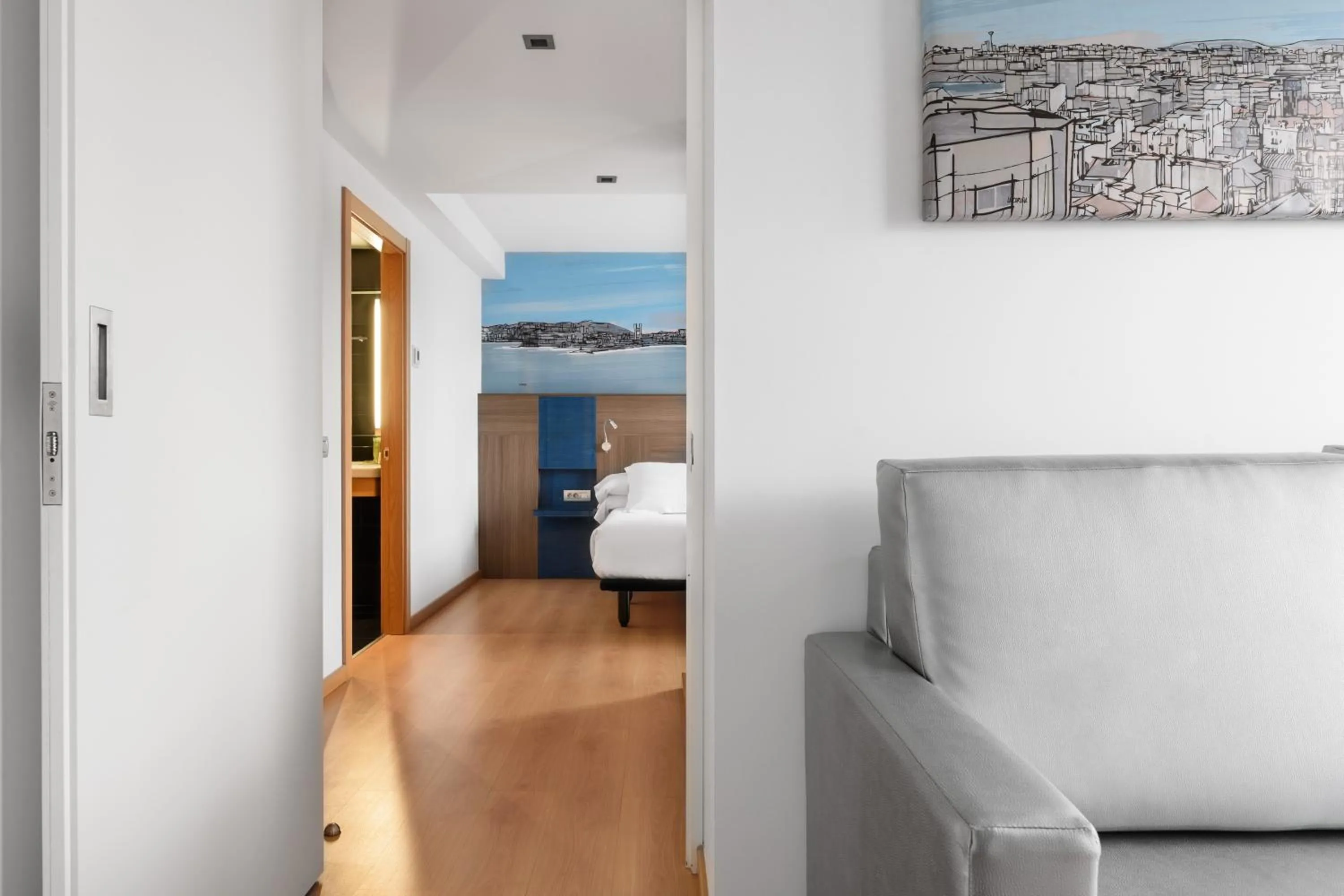 Living room, Bed in Eurostars Blue Coruña