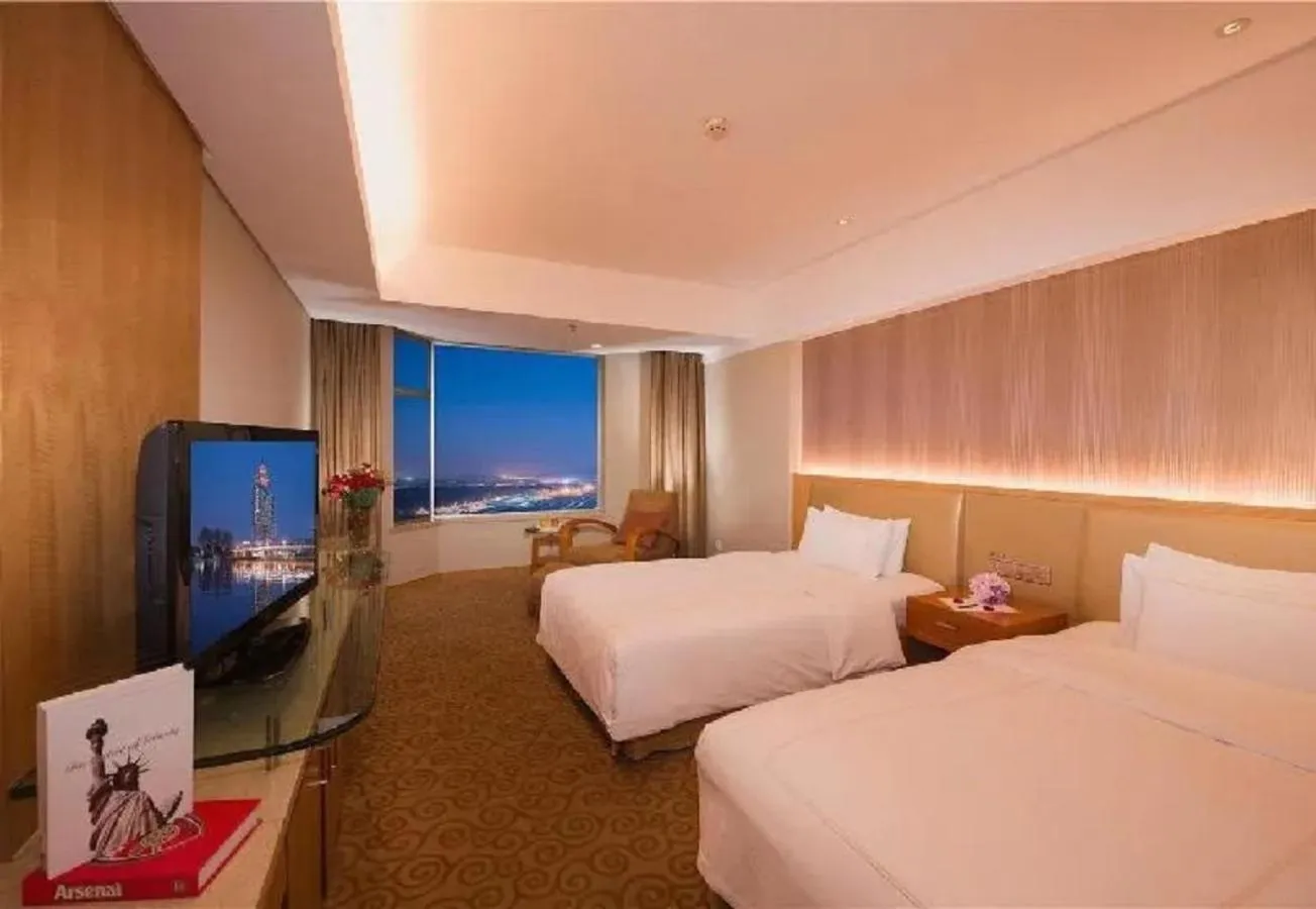 Photo of the whole room, Bed in Shu Guang International Hotel
