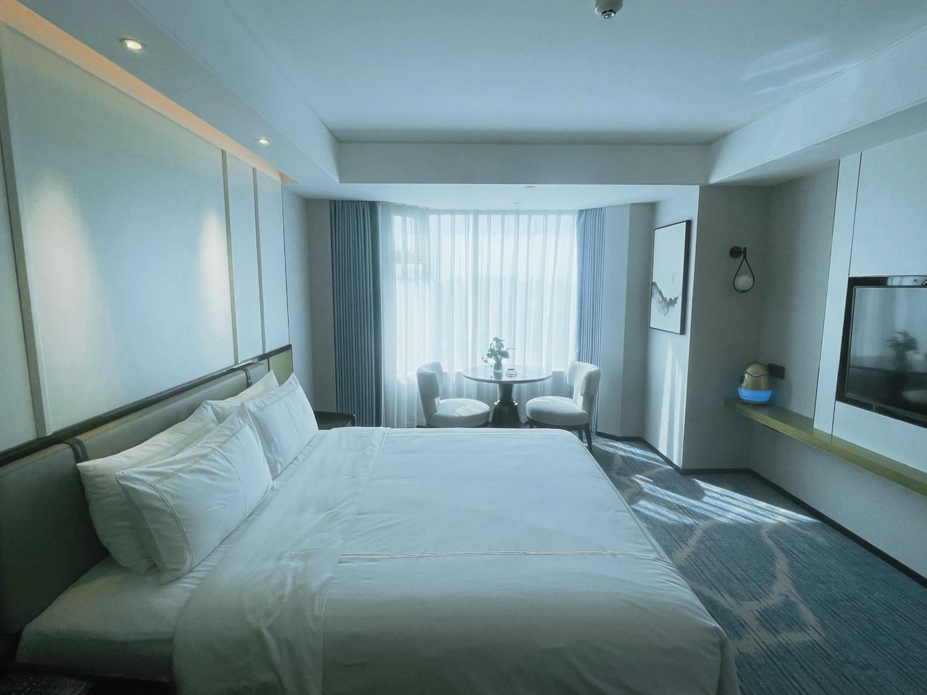 Bed in Shu Guang International Hotel