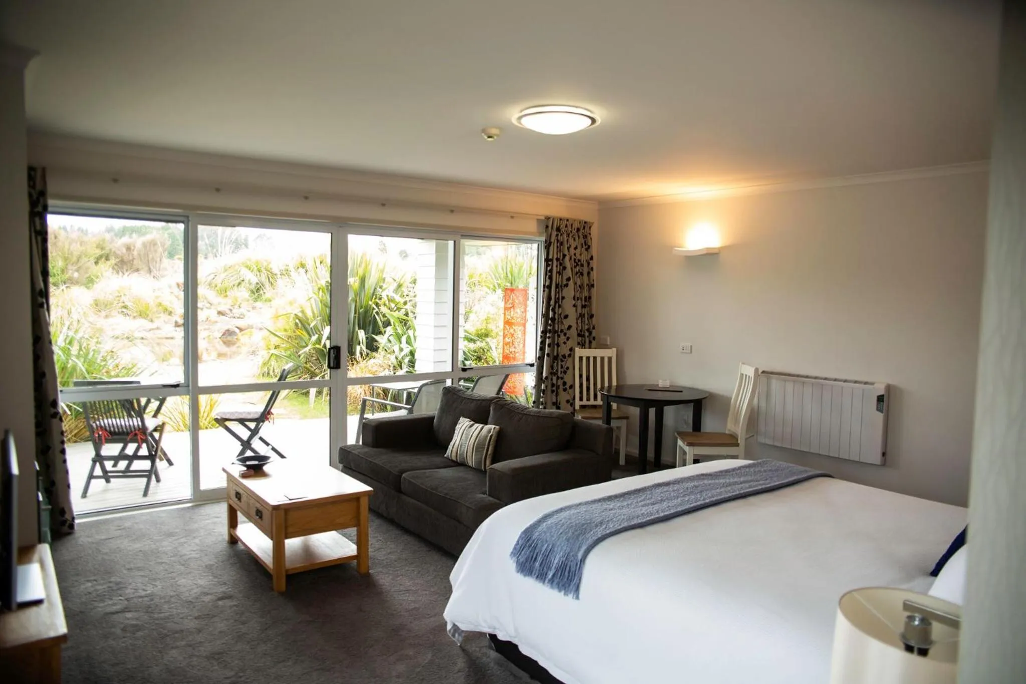 Bed in Tongariro Suites