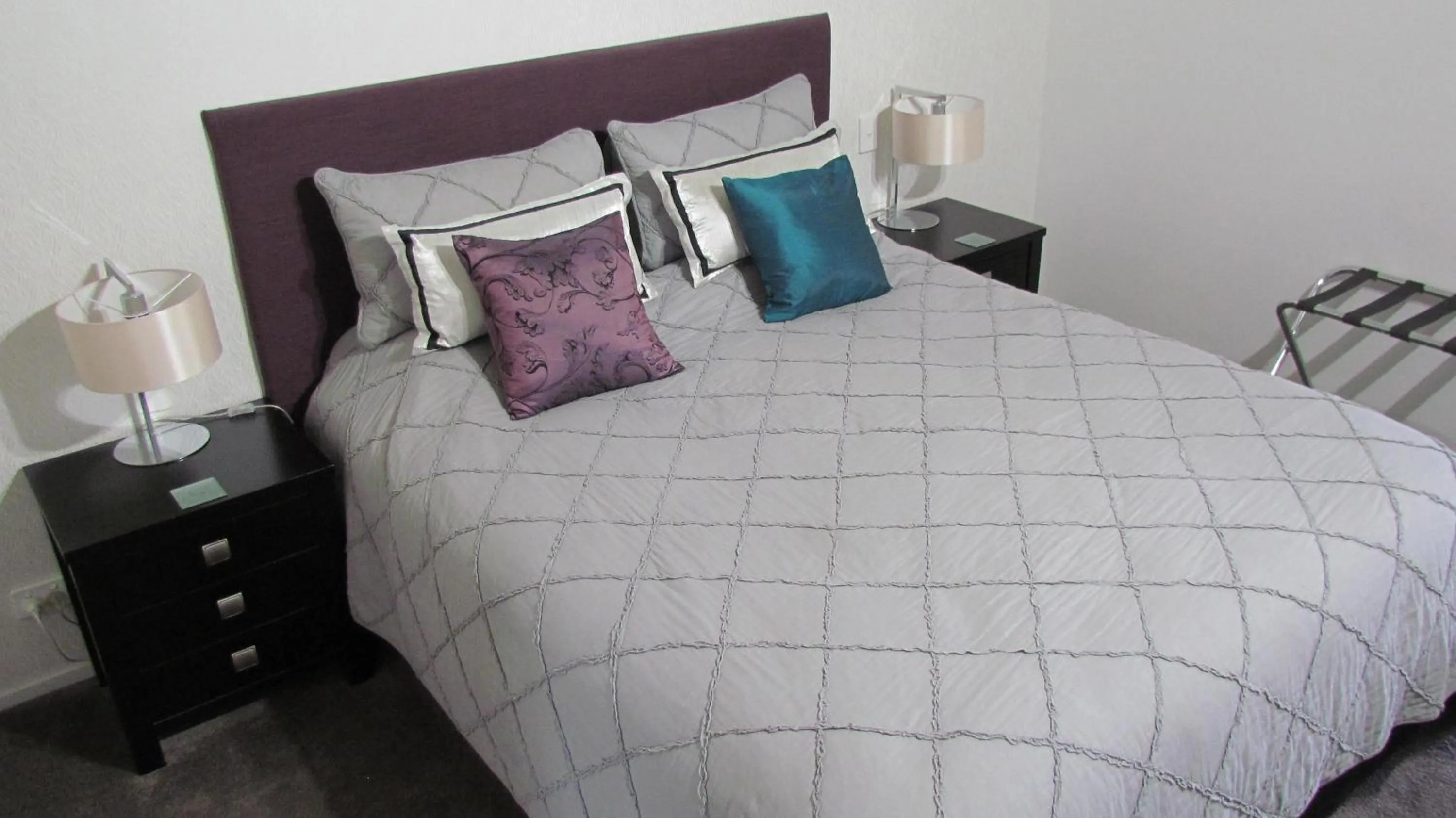 Bed in Tongariro Suites