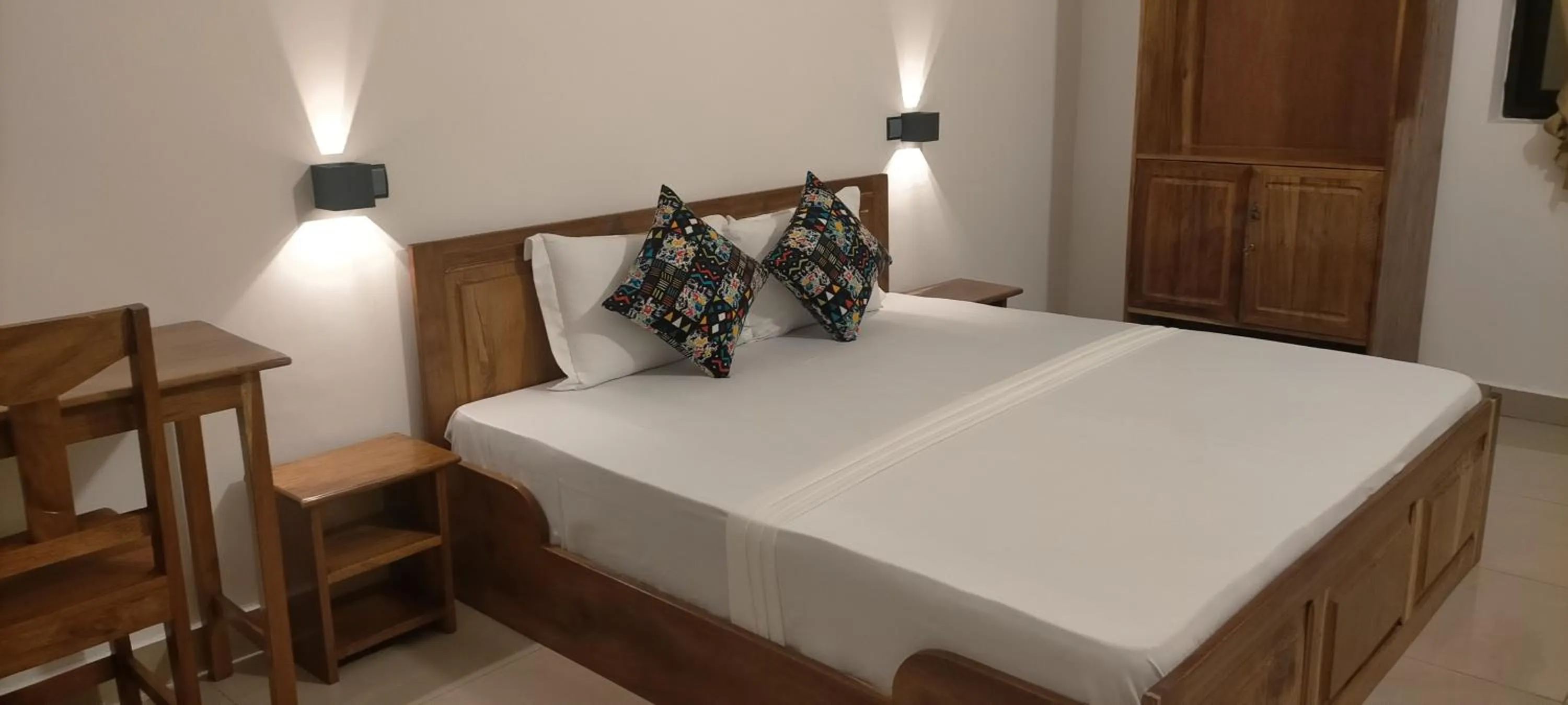 Bed in AZURIA HOTEL