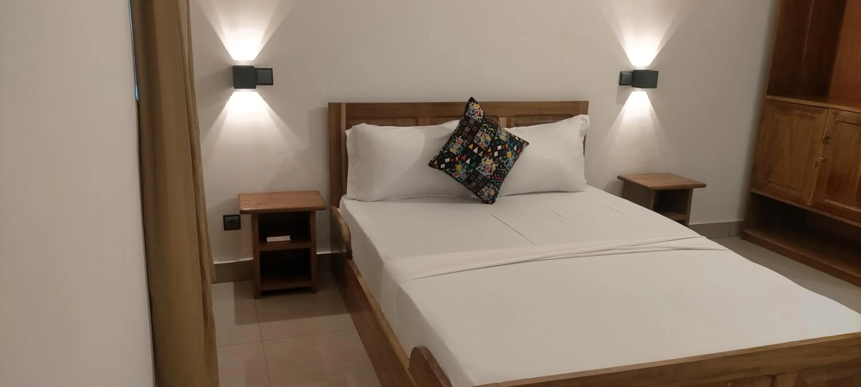 Bed in AZURIA HOTEL
