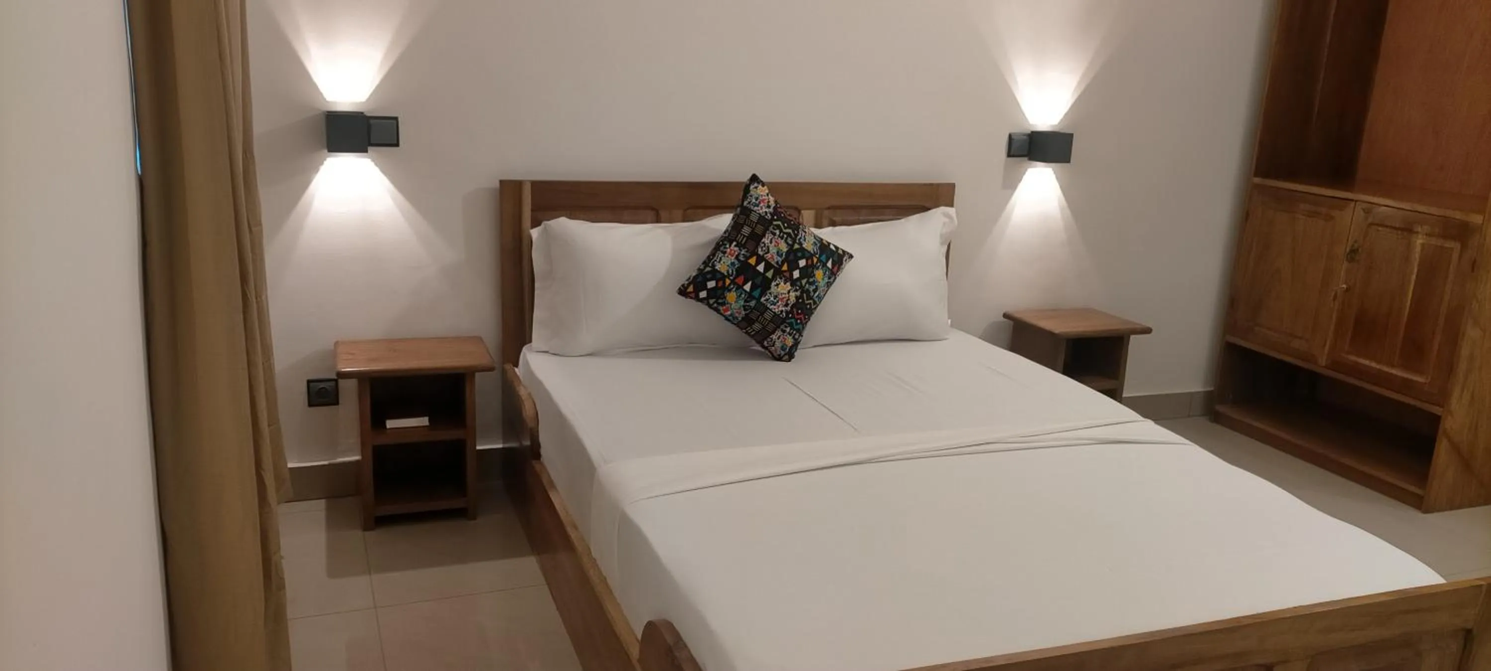 Bed in AZURIA HOTEL