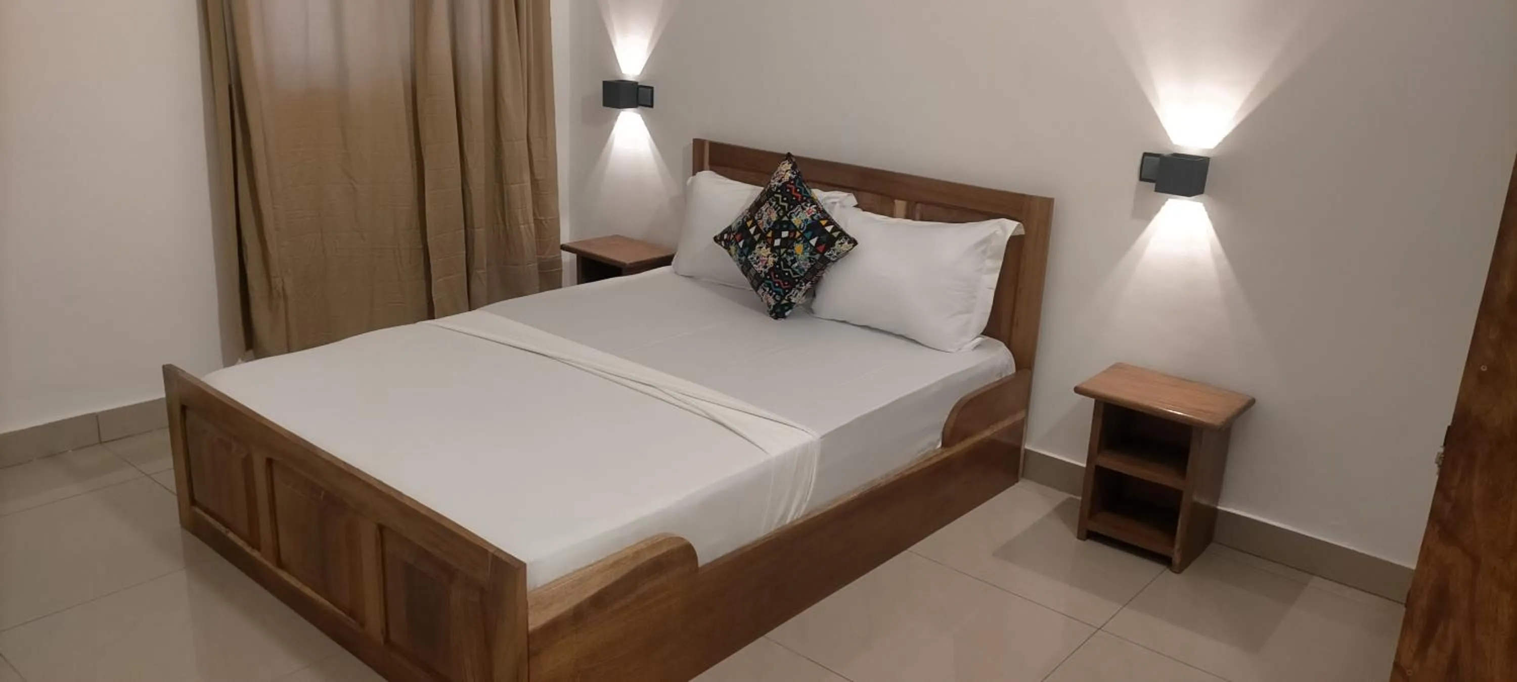 Bed in AZURIA HOTEL