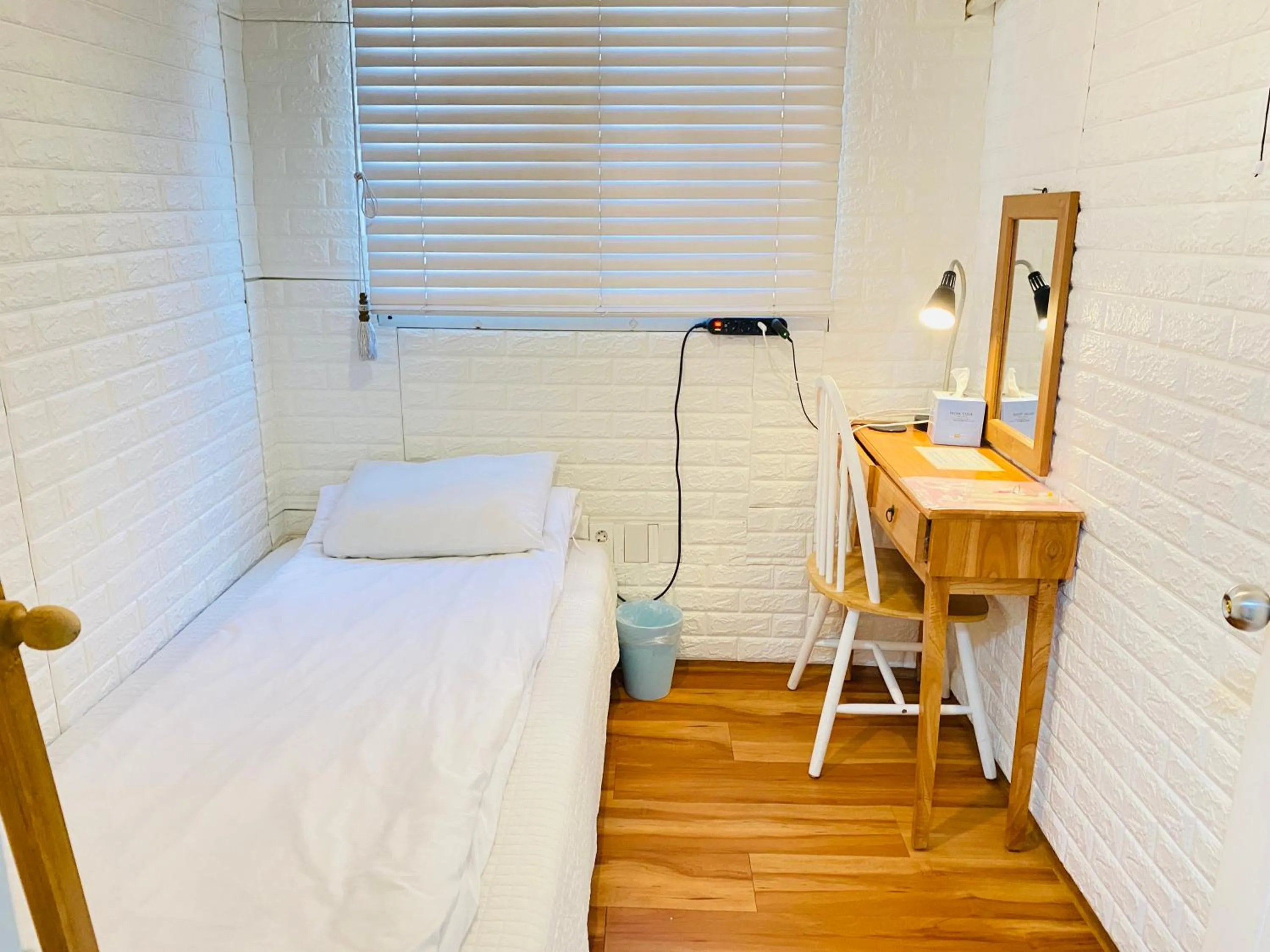 Photo of the whole room, Bed in Aroha Guesthouse Seoul Station