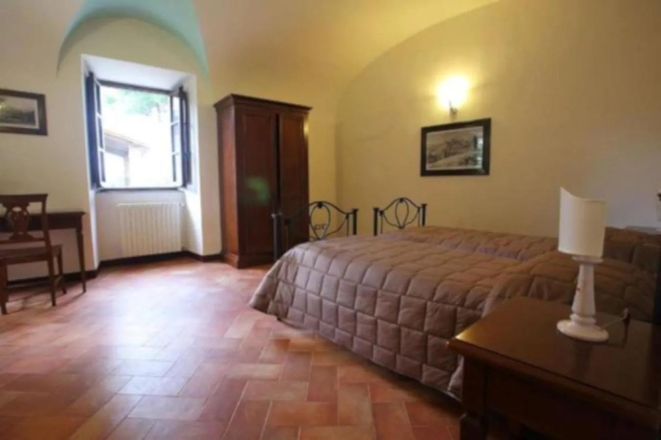 Bed in Antico Borgo La Commenda