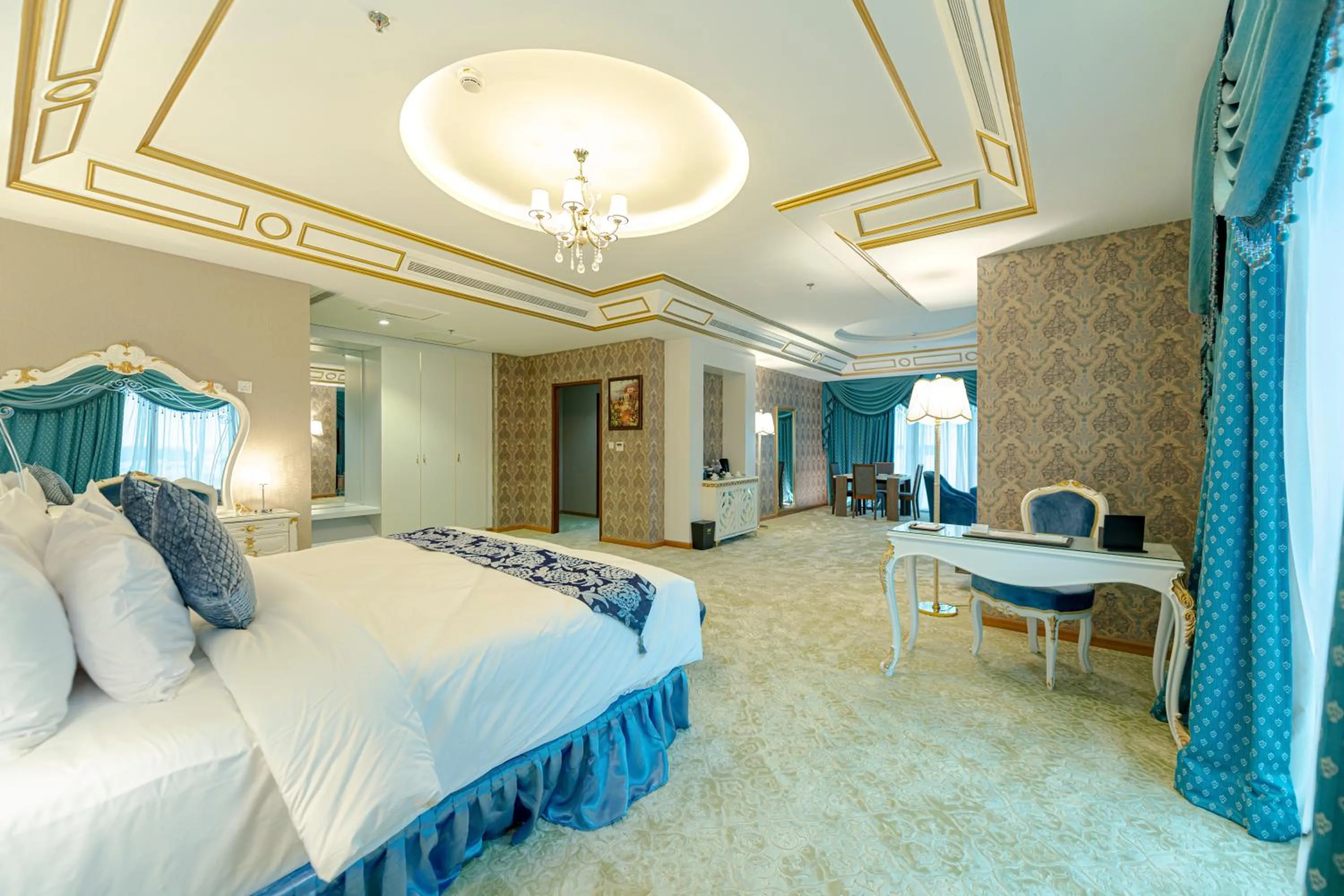 Seating area, Bed in WA Hotel