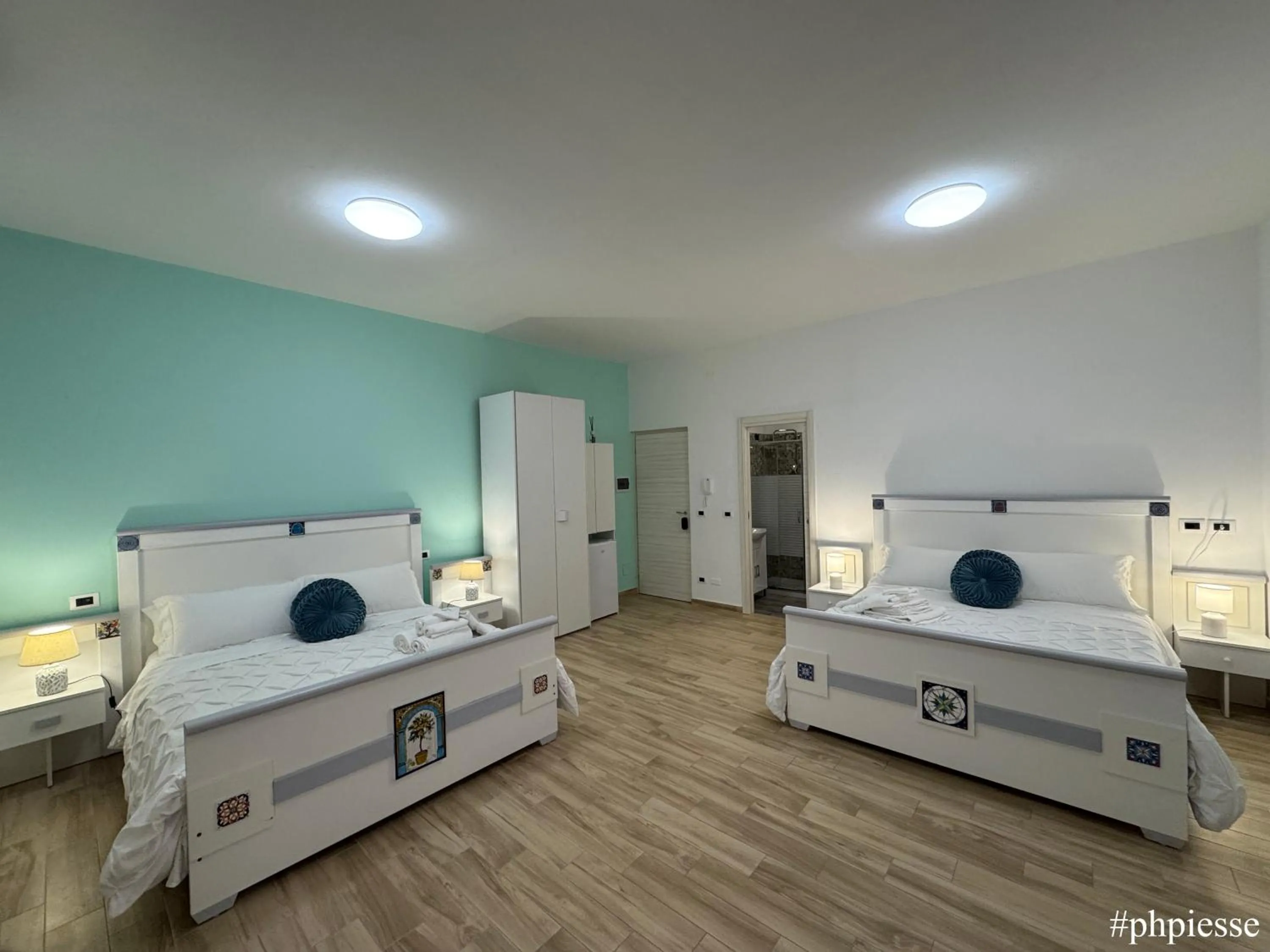 Photo of the whole room, Bed in Emerella Luxury Suites-Siderno Lungomare