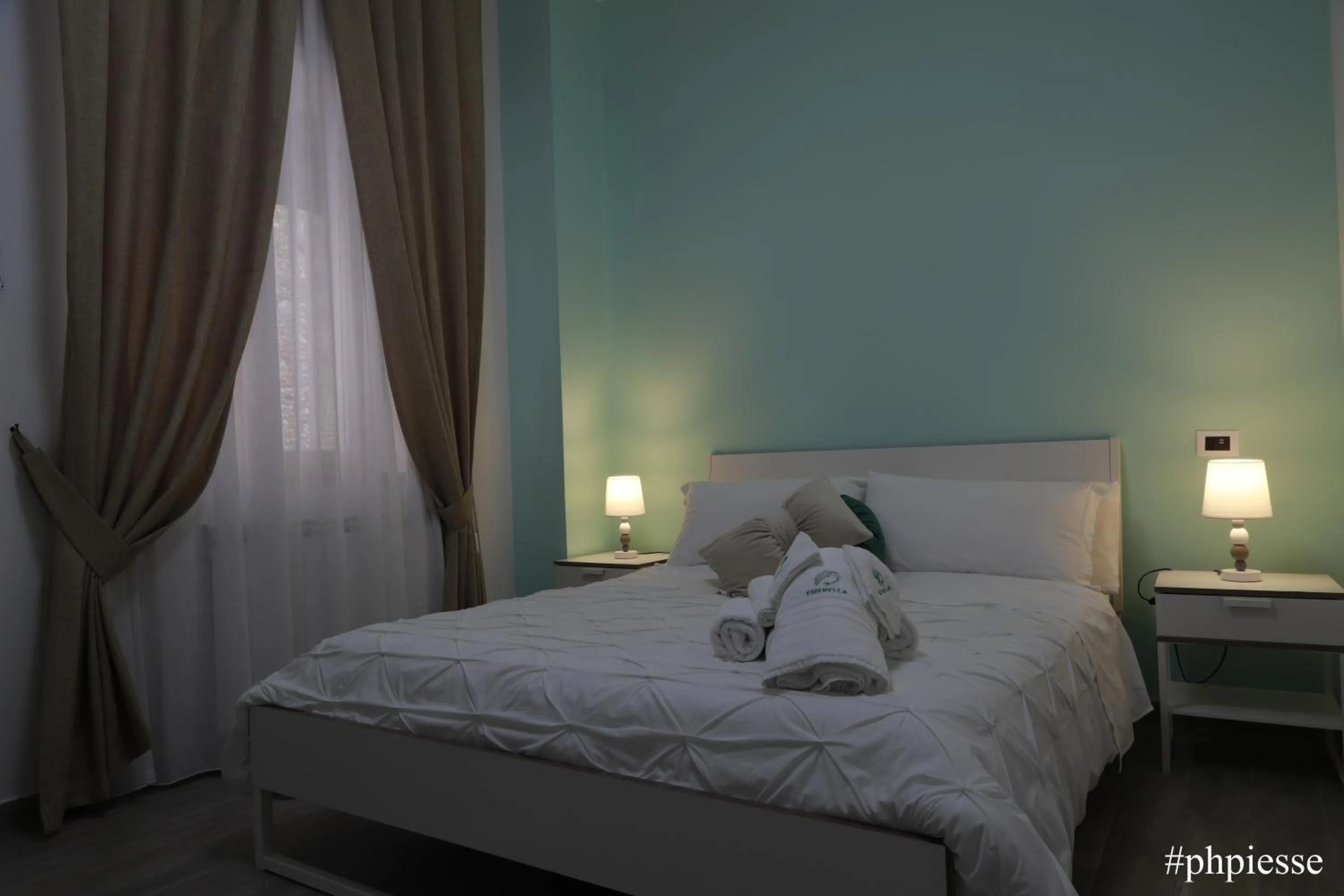 Photo of the whole room, Bed in Emerella Luxury Suites-Siderno Lungomare