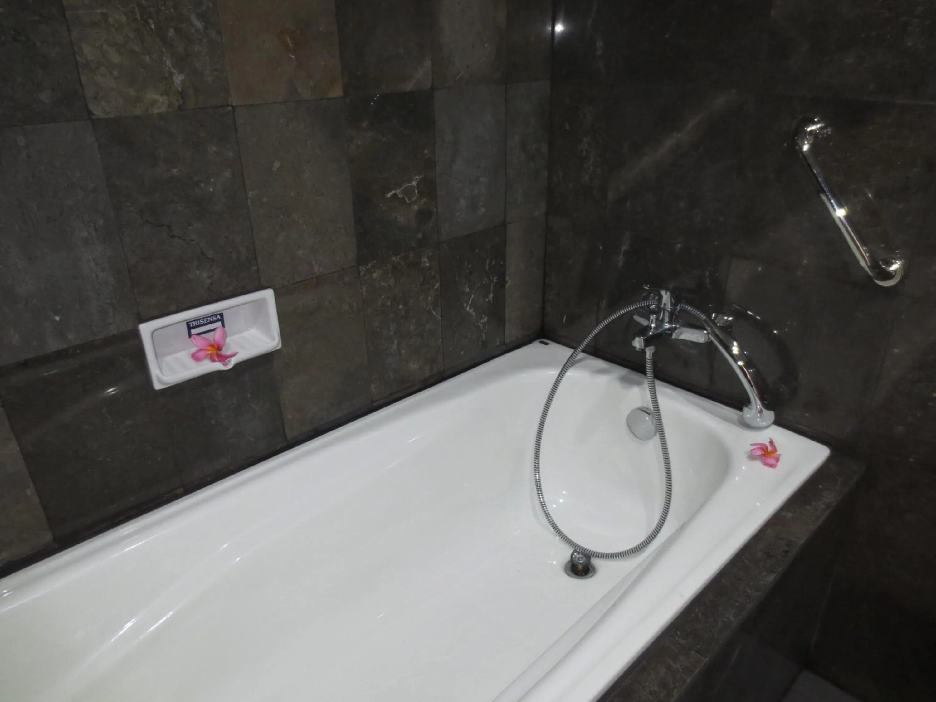 Bathroom in Swastika Guesthouse Sanur