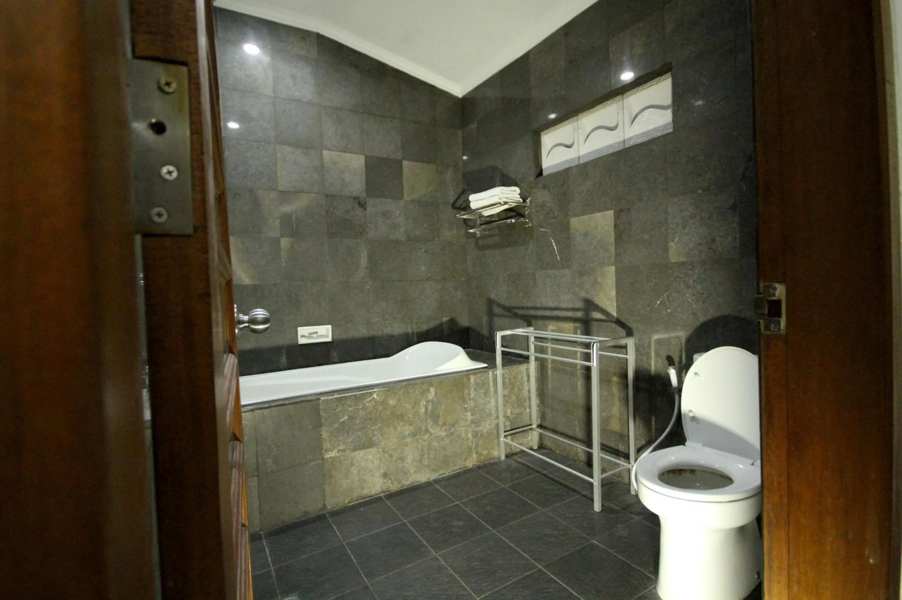 Toilet in Swastika Guesthouse Sanur