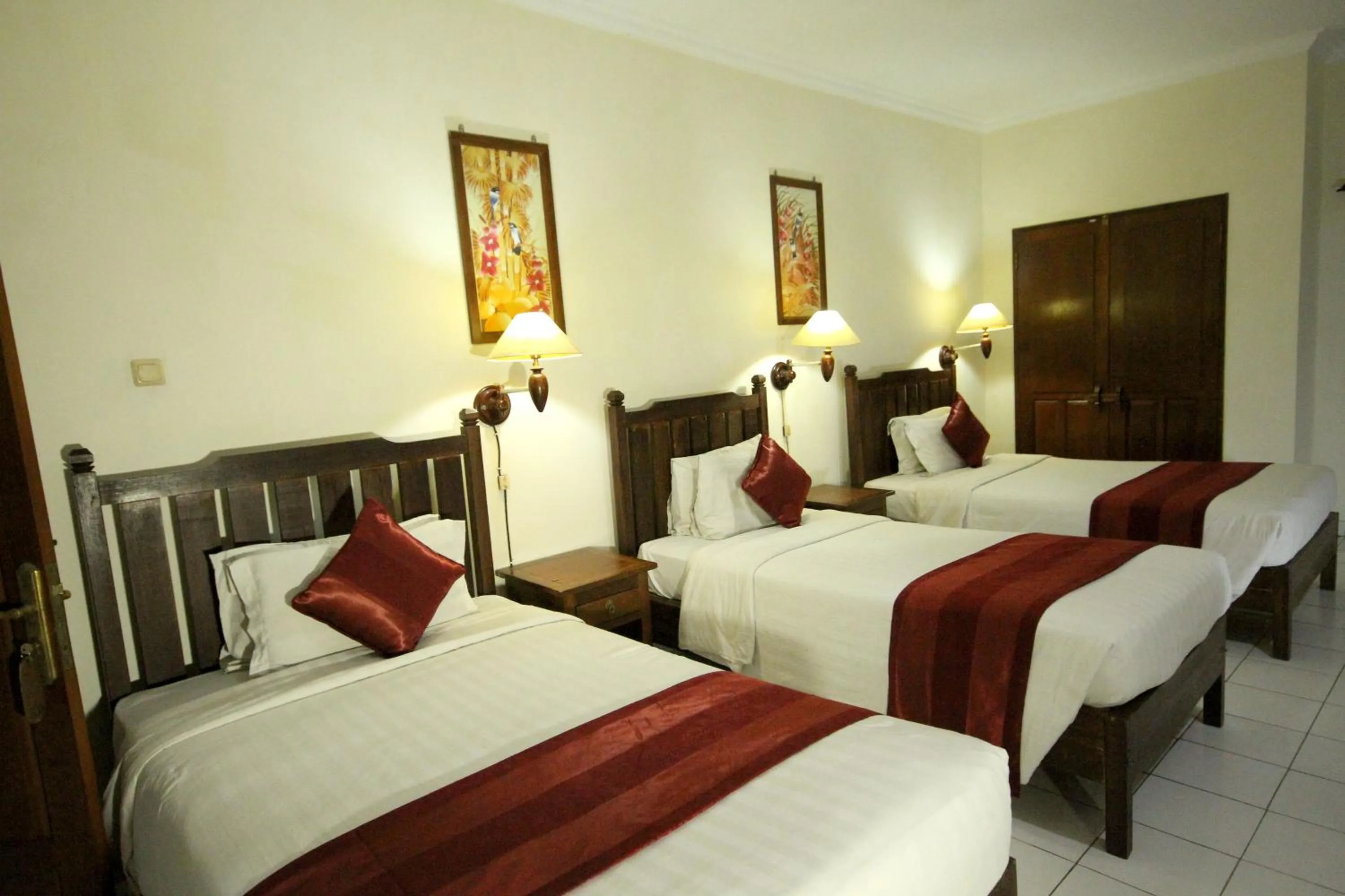 Bed in Swastika Guesthouse Sanur