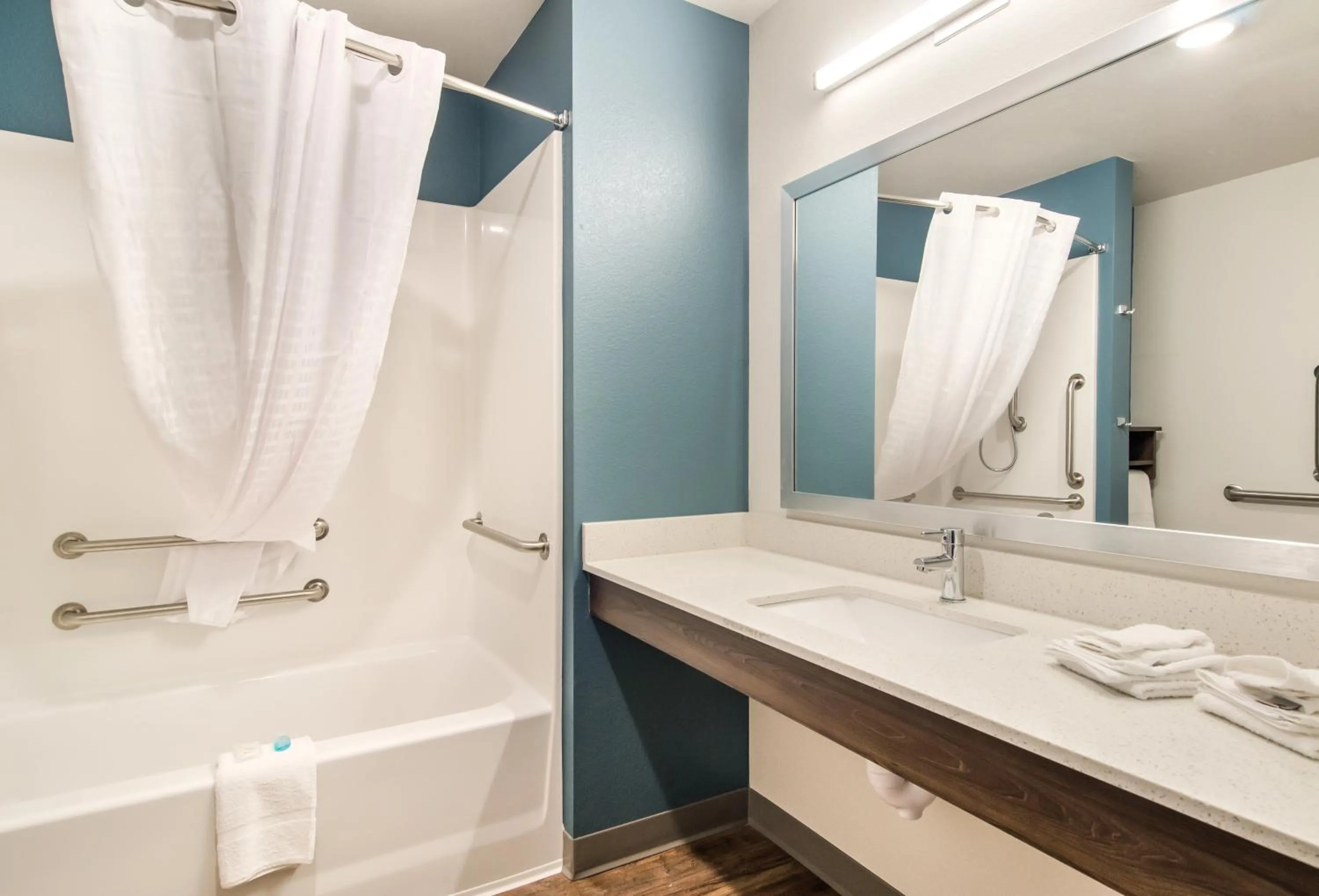 Bathroom in WoodSpring Suites Thornton-North Denver