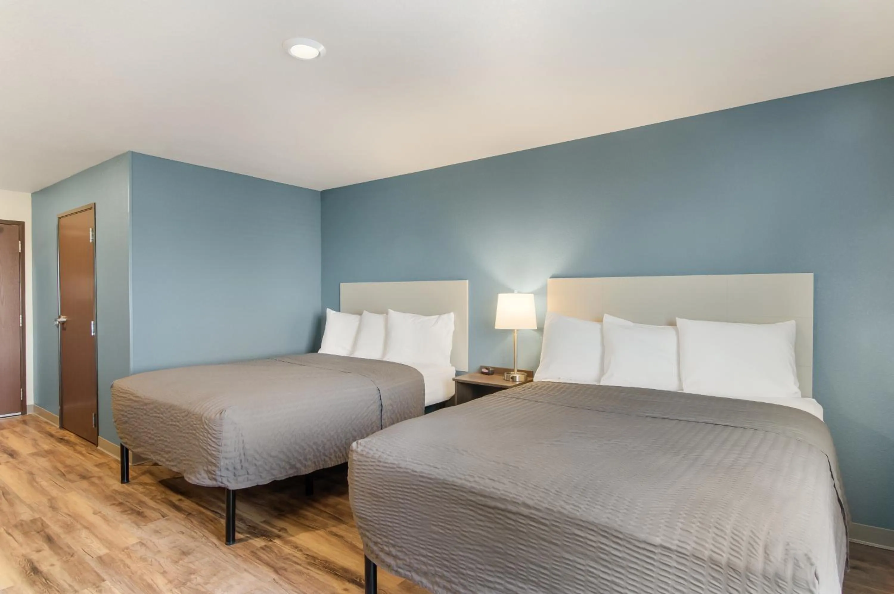 Photo of the whole room, Bed in WoodSpring Suites Thornton-North Denver
