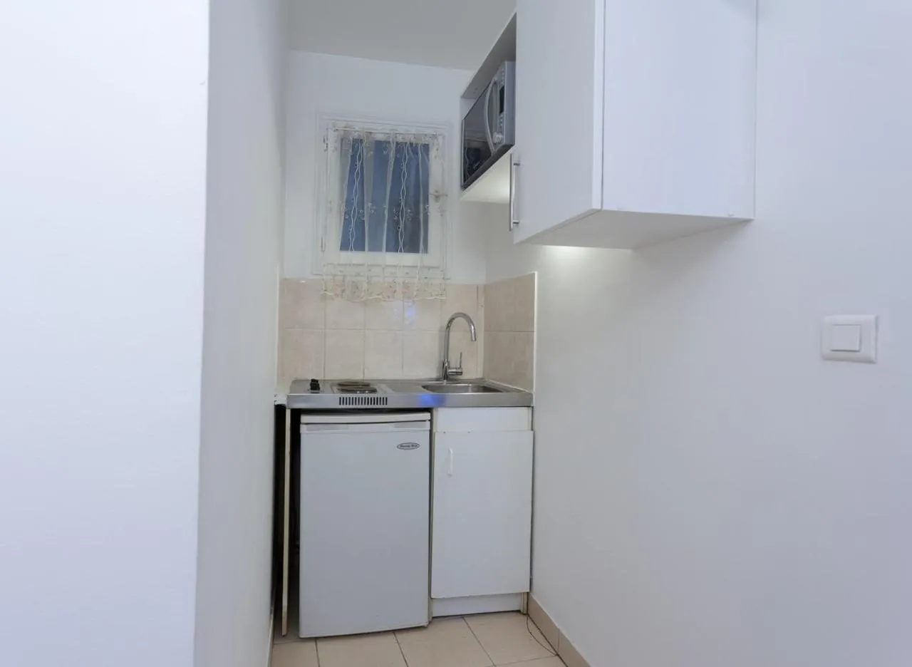 Kitchen or kitchenette in Résidence de Bourgogne