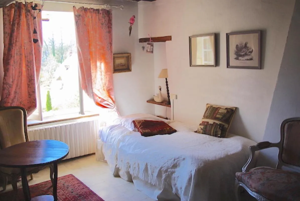 Bed in Maison d'hôtes Moulin du Bas Pesé