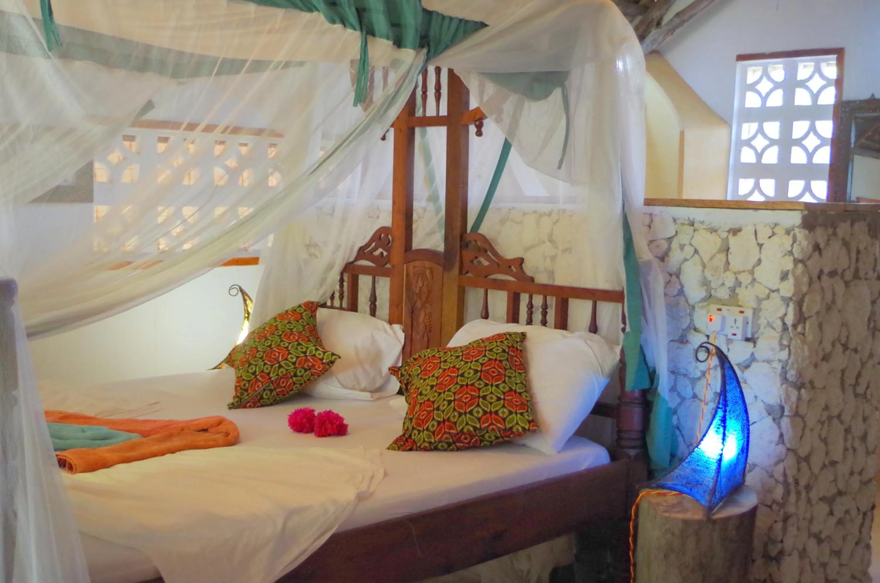 Bed in Mbuyuni Beach Village